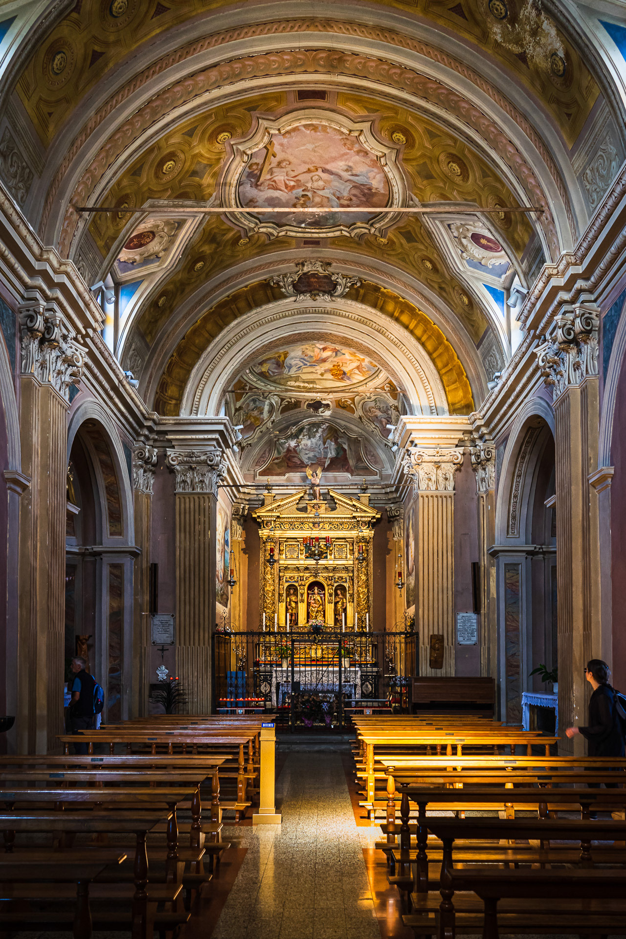 The interior of the church is richly decorated and contains some historical pictures and frescoes.