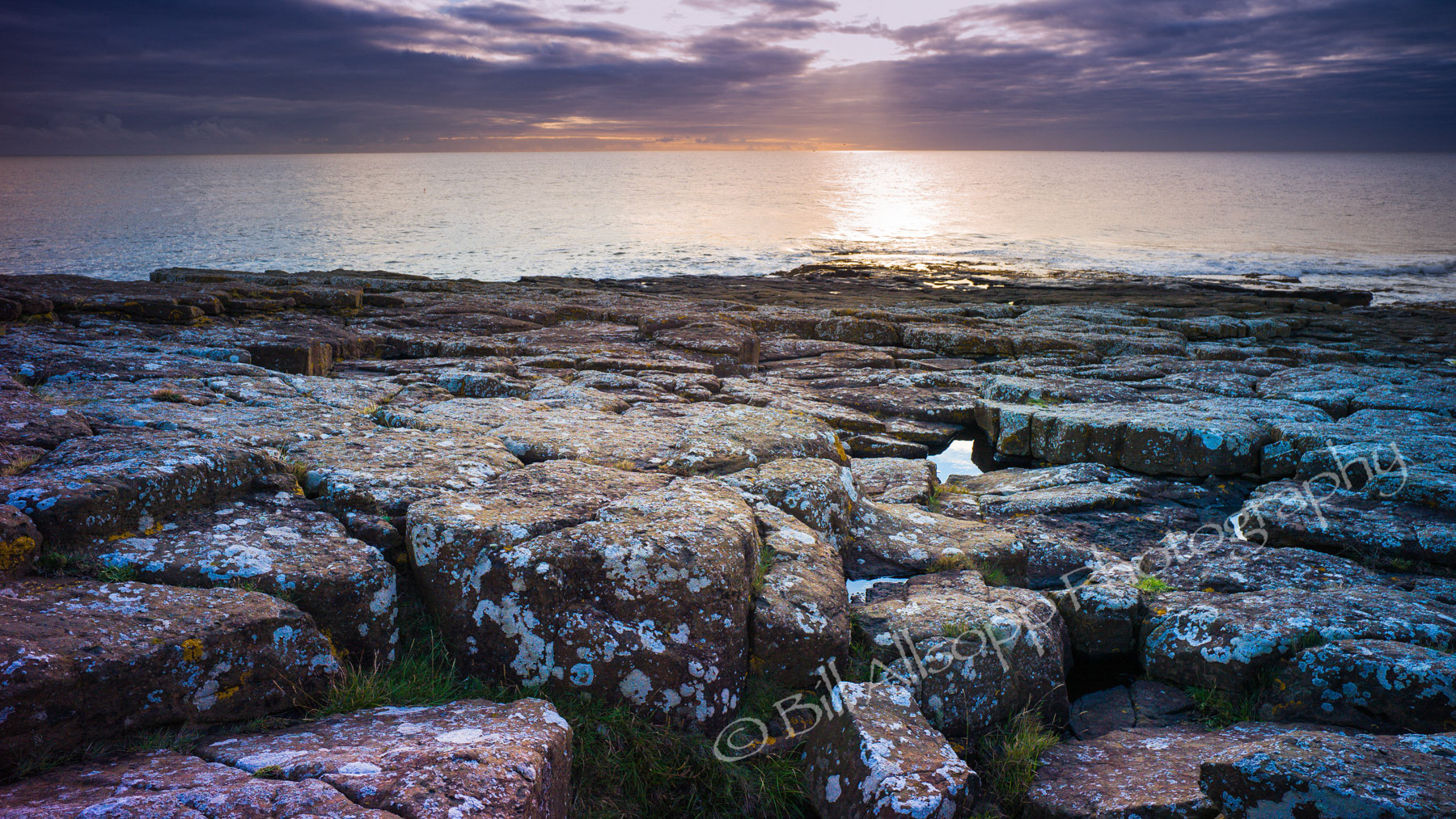 The rocky Northumberland coast just after dawn.
