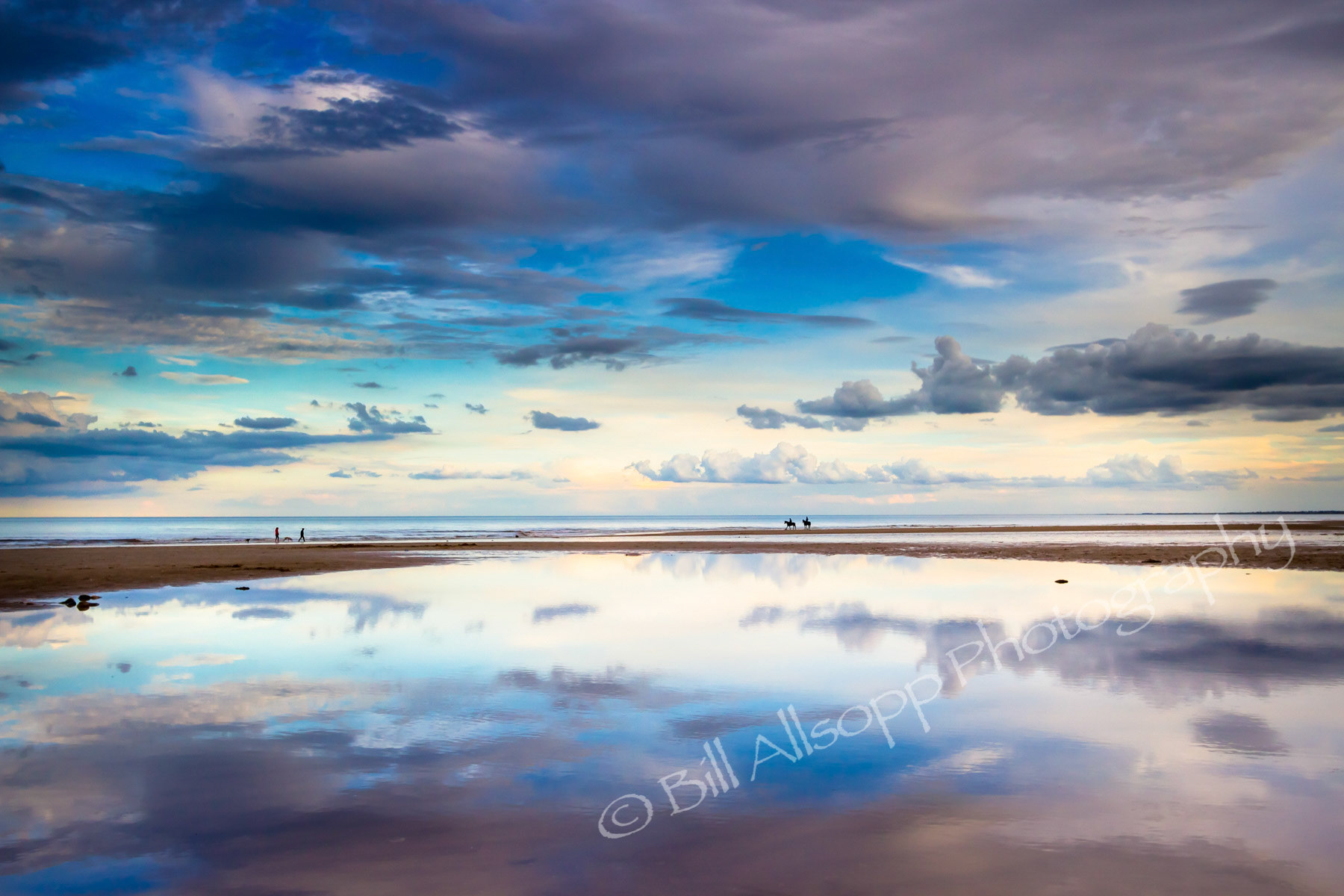 Reflections in a pool on a Yorkshire beach.