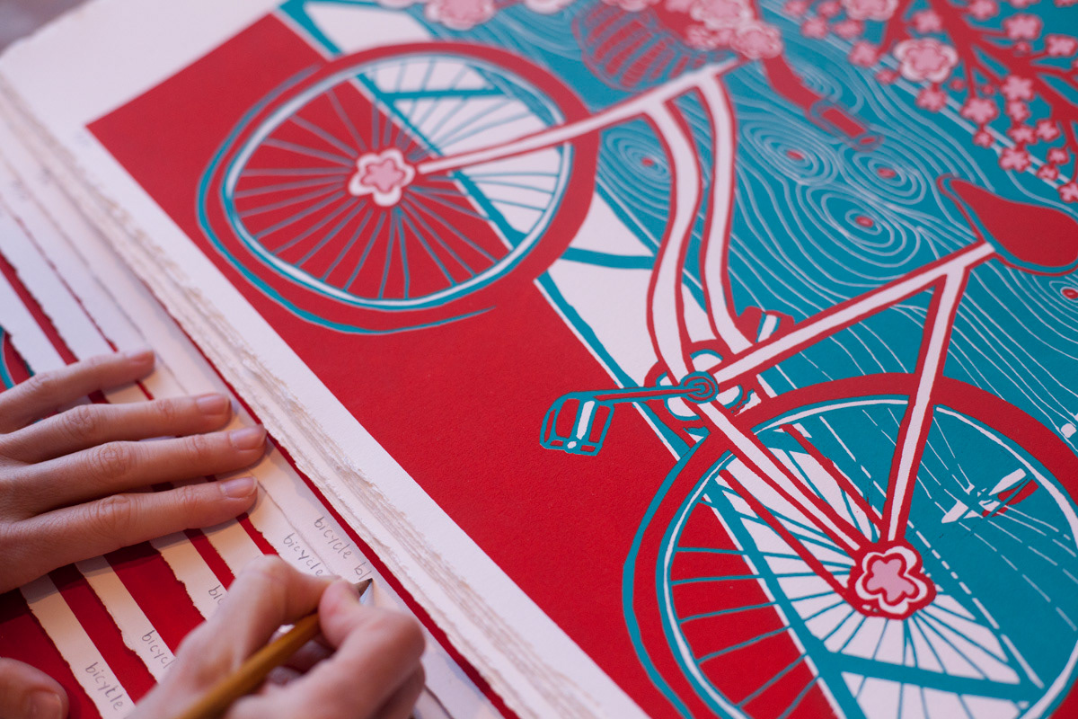Signing my print edition. Photo by Francis Tatem / BicycleSPACE