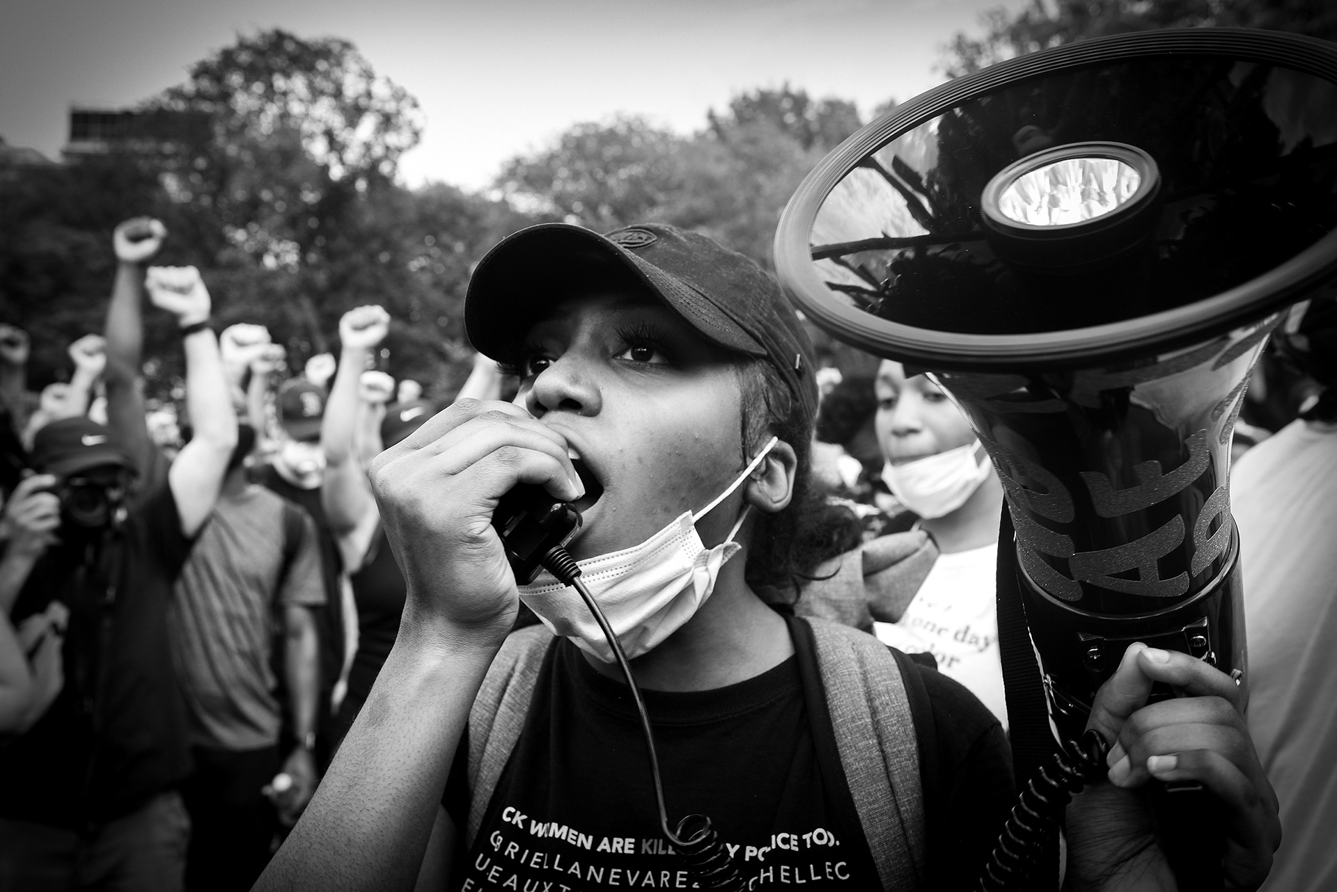 Chelsea Miller leads protestors through Washington Sq. Park, NYC