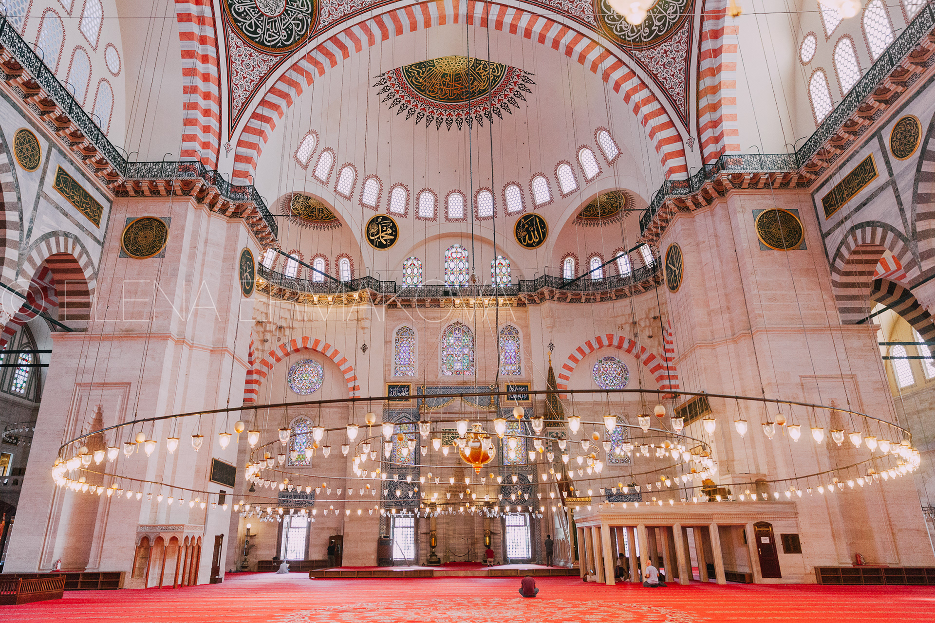 A men pray inside the Suleymaniye Mosque, Istanbul, Turkey
