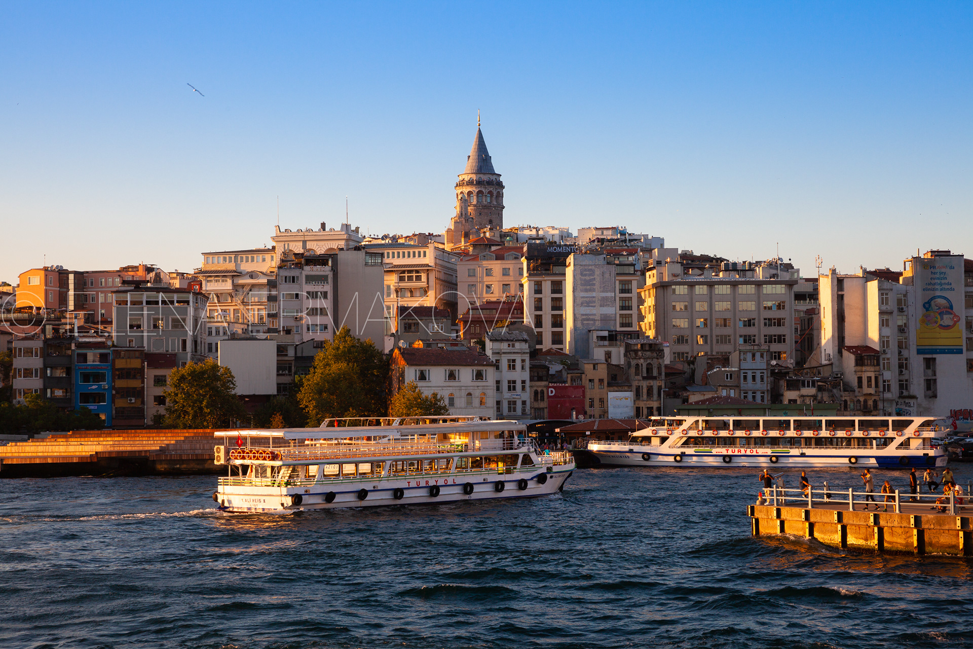 The beautiful view of the Galata Tower and Golden Horn at sunset, Istanbul, Turkey