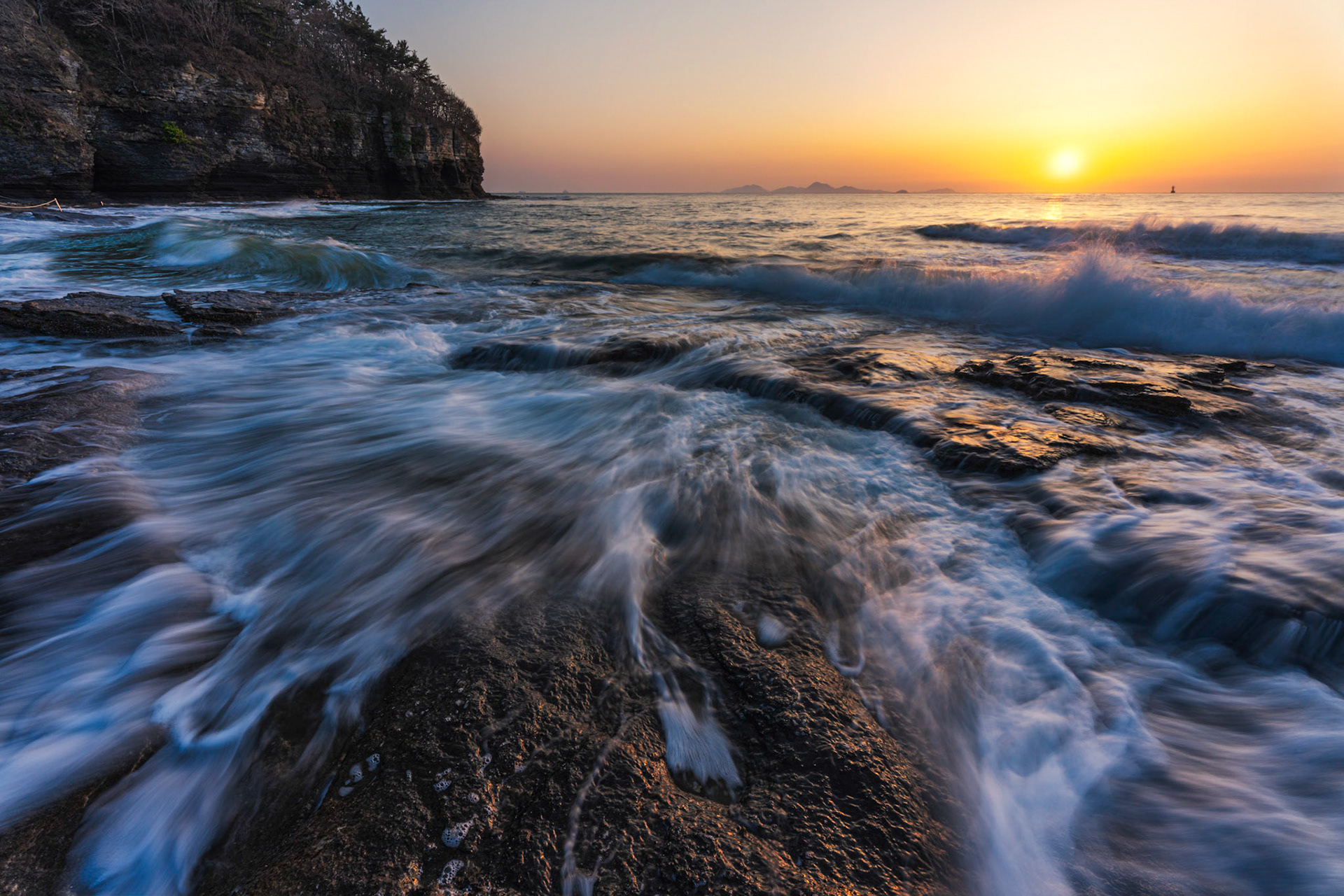 Chaeseokgang, South Korea - 13 APRIL 2020: The Chaeseokgang sea cliffs are a popular attraction along the coast of Byeonsanbando National Park.