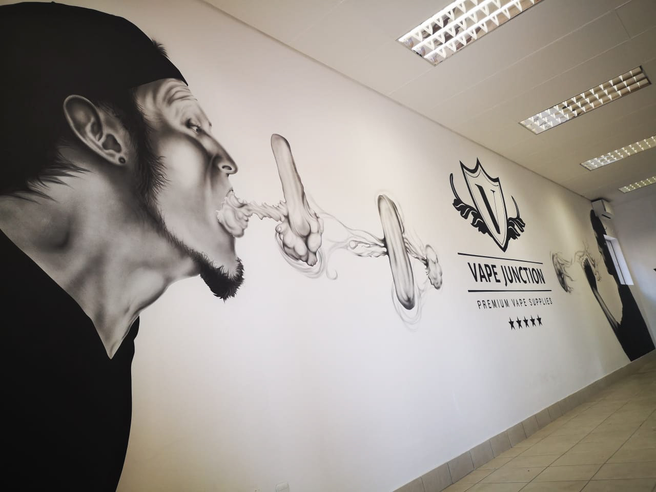 full stretch Airbrushed wall mural black and white vape tricks and vape junction logo