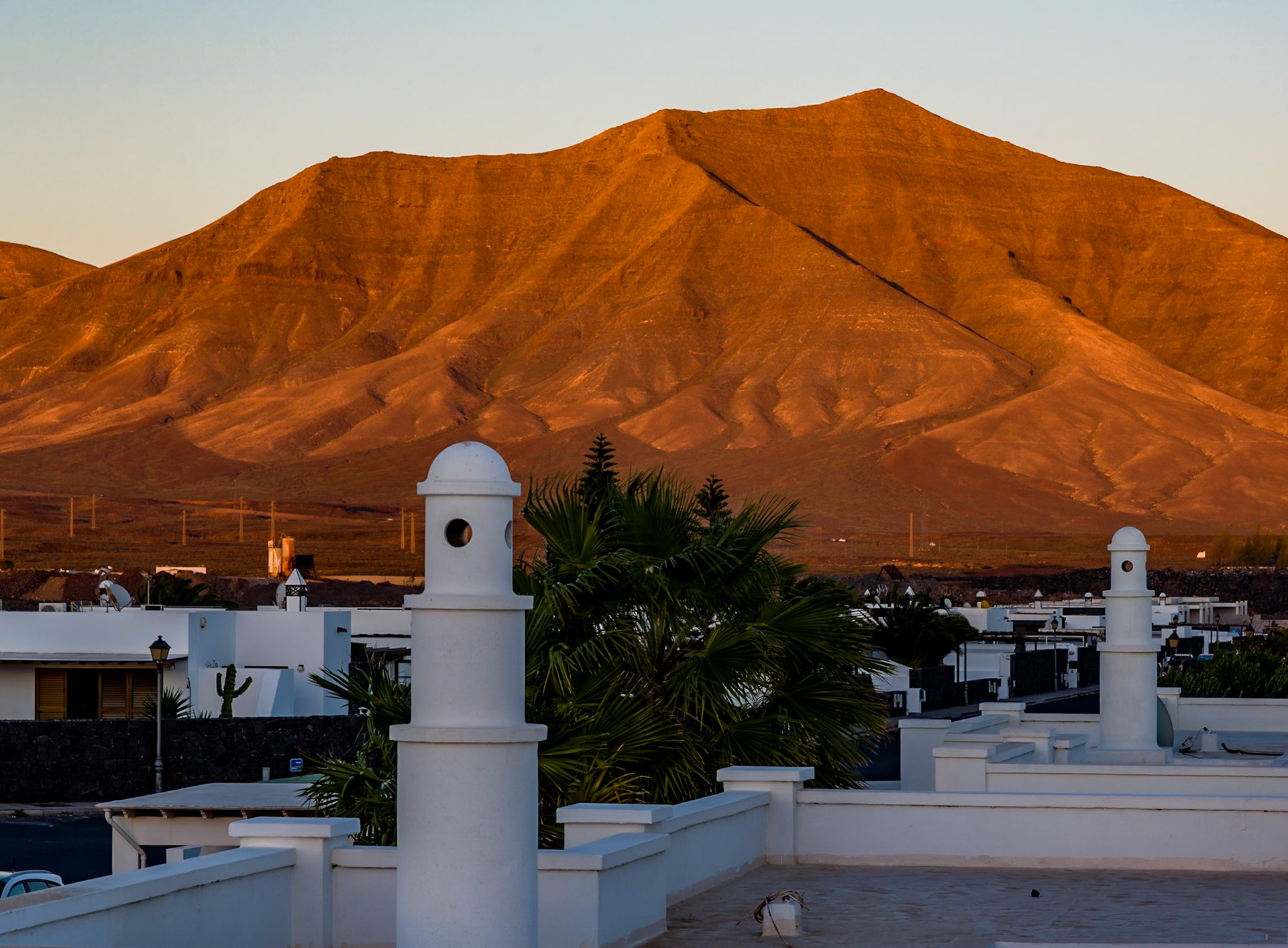 Playa Blanca, Lanzarote. The natural redness is enhanced by the late afternoon sun.