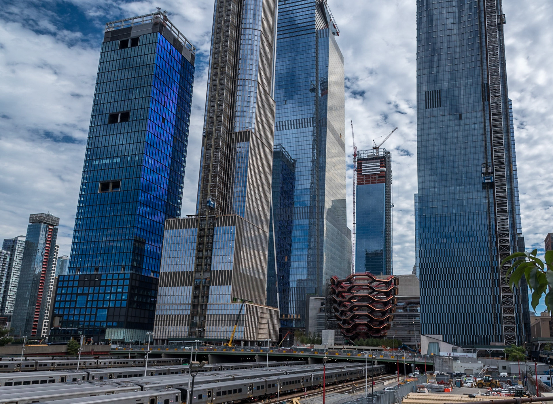 The vessel, dwarfed by adjacent skyscrapers, Manhattan