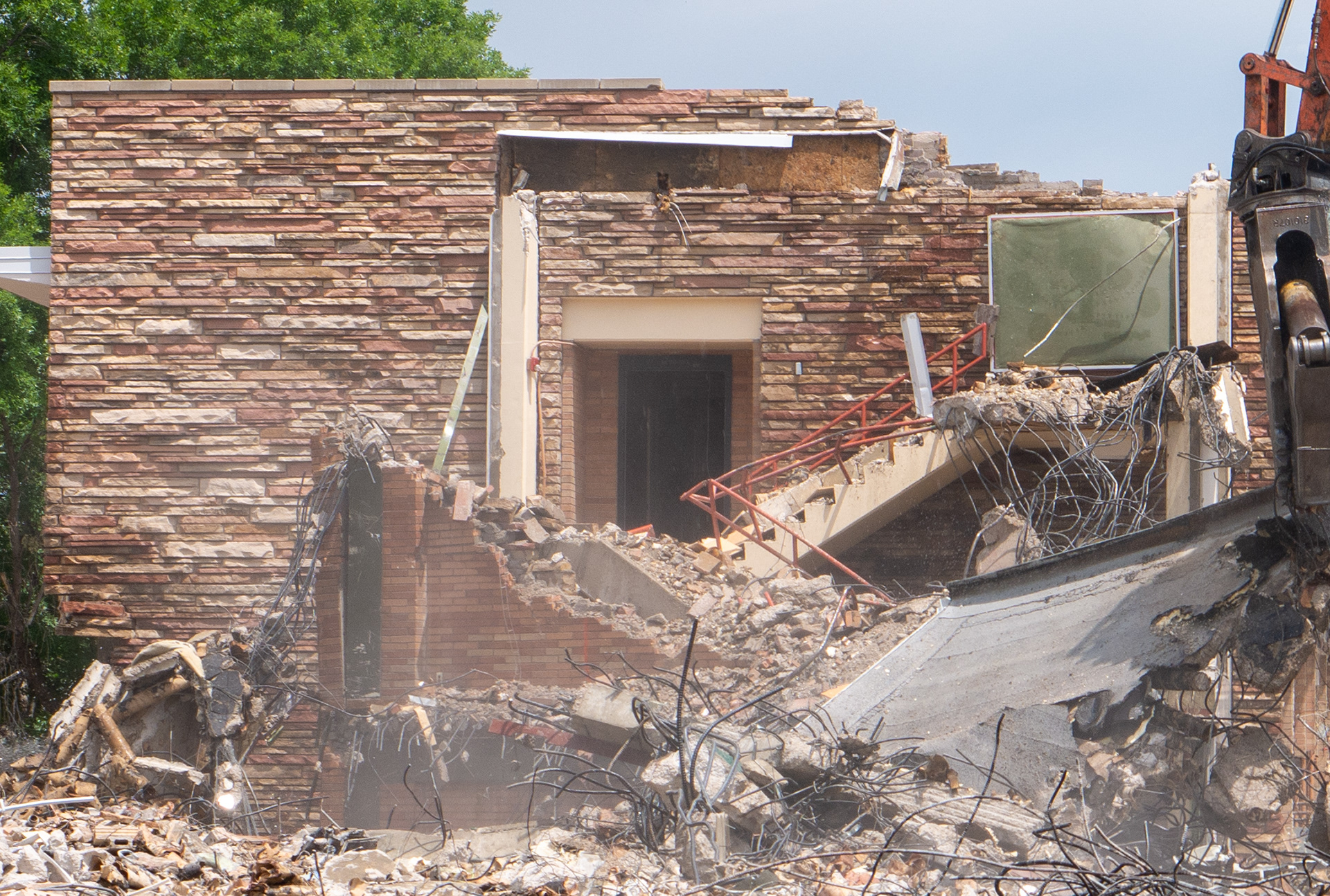 Demolition of the north central stairwell, west-facing side