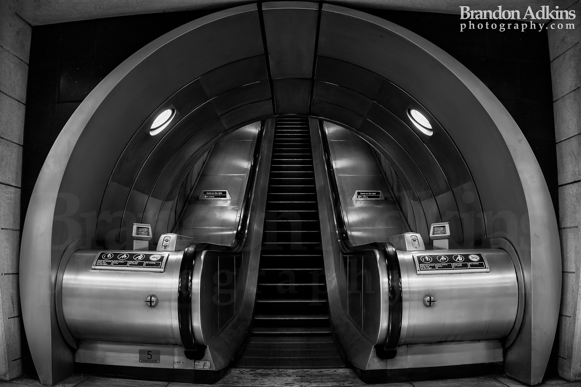 Fine art landscape of escalator in Southwark Station in underground subway system in England