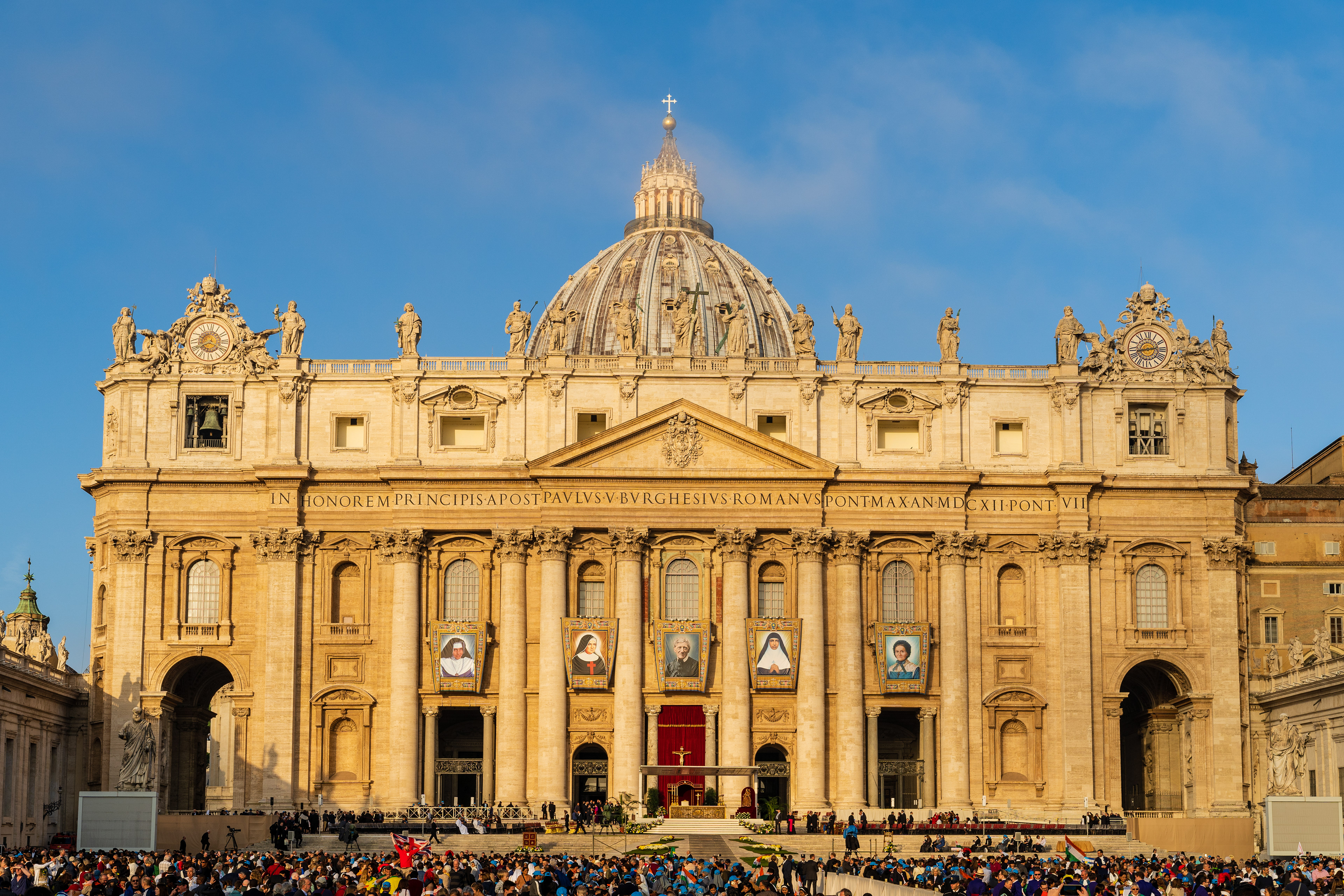 Vatican City, October 13, 2019. Tapestries of the five blessed made new saints by Pope Francis, hang from the facade of St. Peter's Square during the canonization mass. STRICTLY ONLY FOR EDITORIAL_05