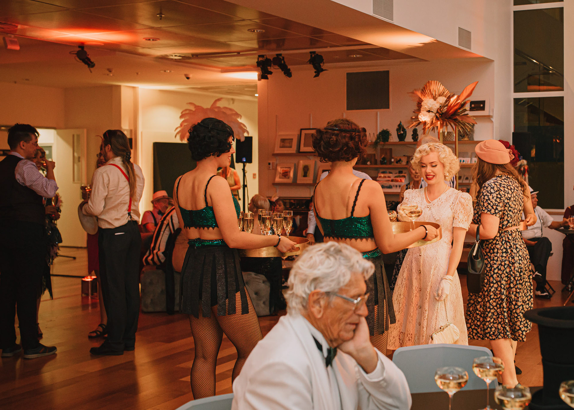 Guests mingling at the MTG Hawke's Bay's Art Deco Festival event