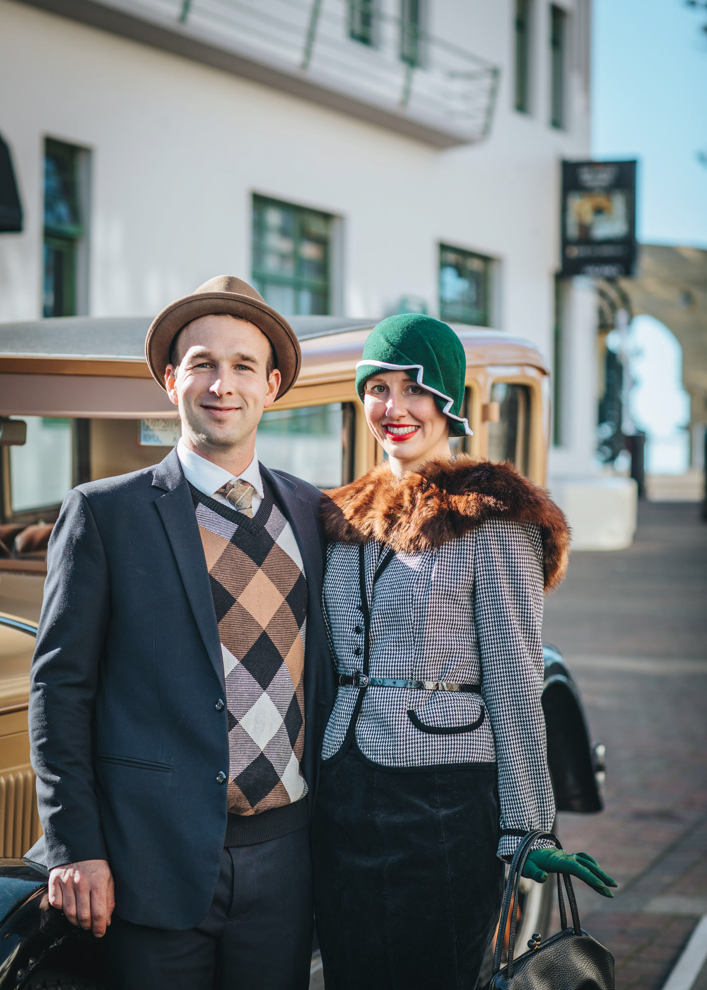 Winter Art Deco, a couple in day wear outside from the Masonic Hotel