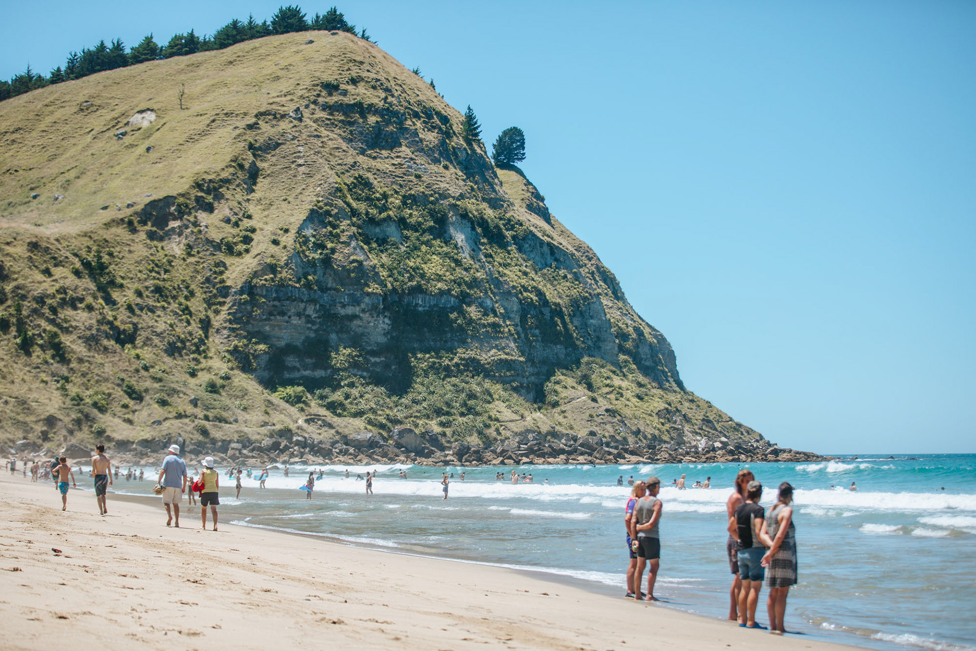 Beach goers at Waipatiki in the summertime