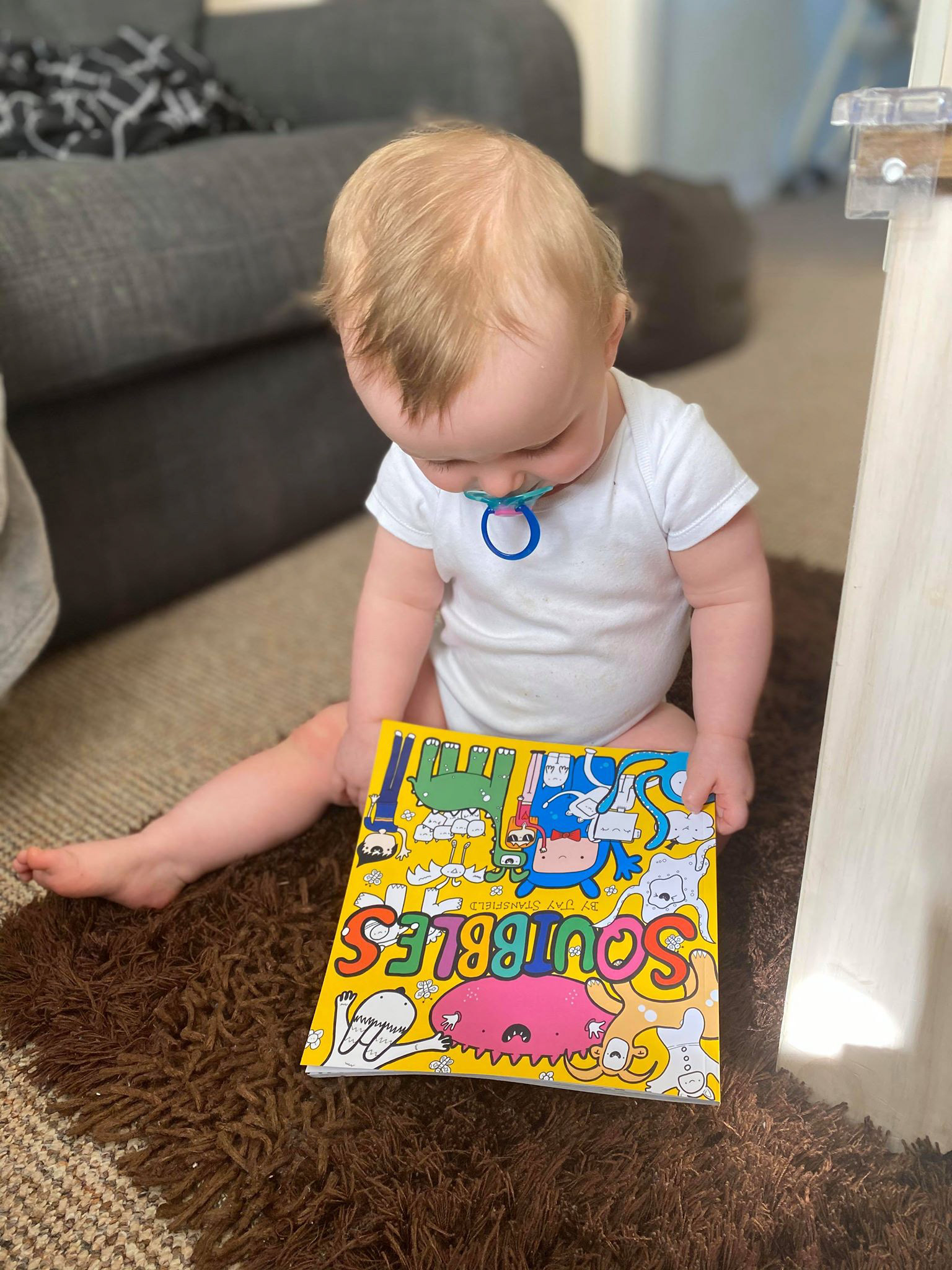 Squibbler with a copy of Squibbles