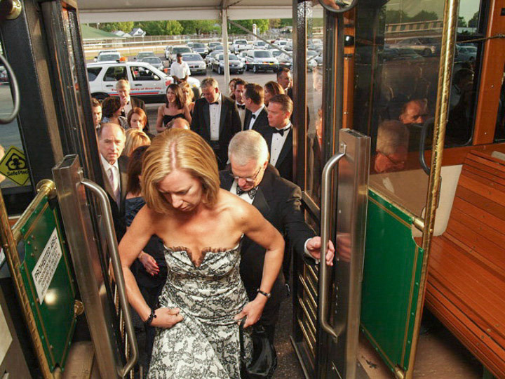 Tammy and Dr Thomas Kmetz boarded one of the trolleys used to transport guests from the parking lot to the track infield where the gala was held
