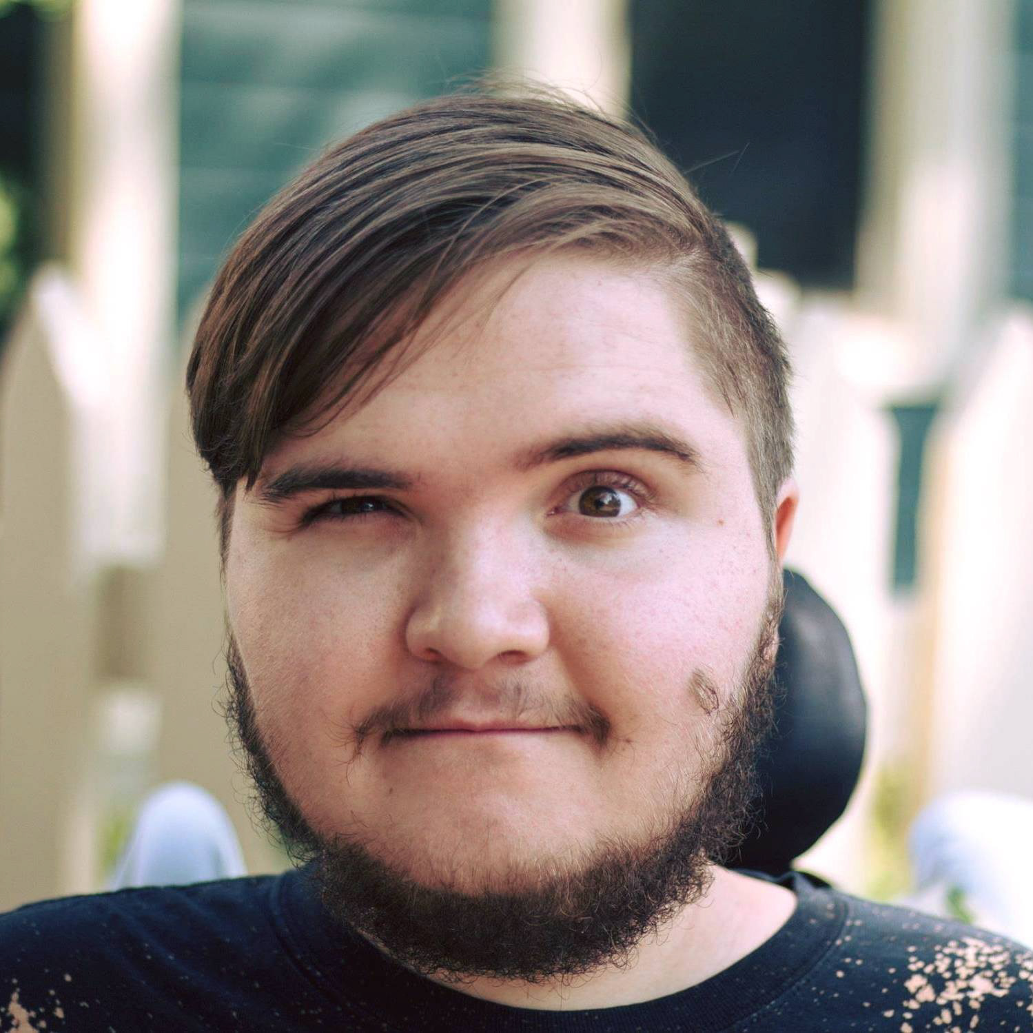 Portrait with winking expression.
