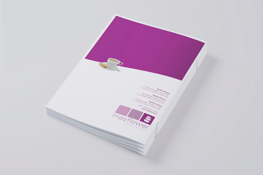 Back cover design of the annual report design showing a photo of a cup of tea with a biscuit.