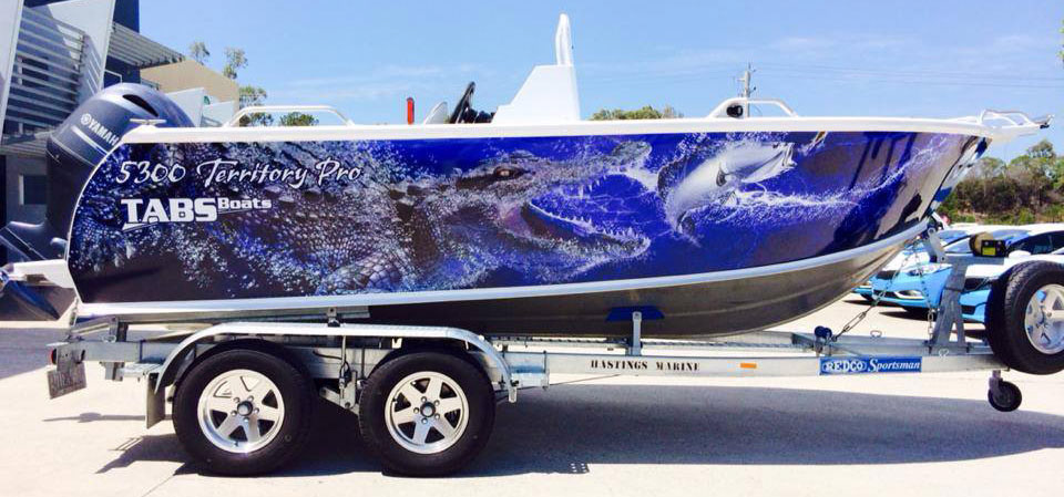 "Blue Barra & Croc" boat wrap - illustrated using stock images in Photoshop