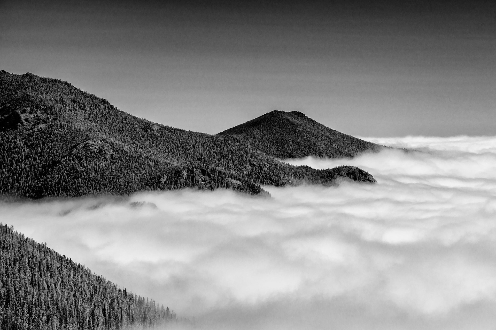 Clouds below in RMNP