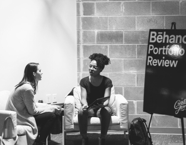 Reviewing a portfolio at the Behance Portfolio Review