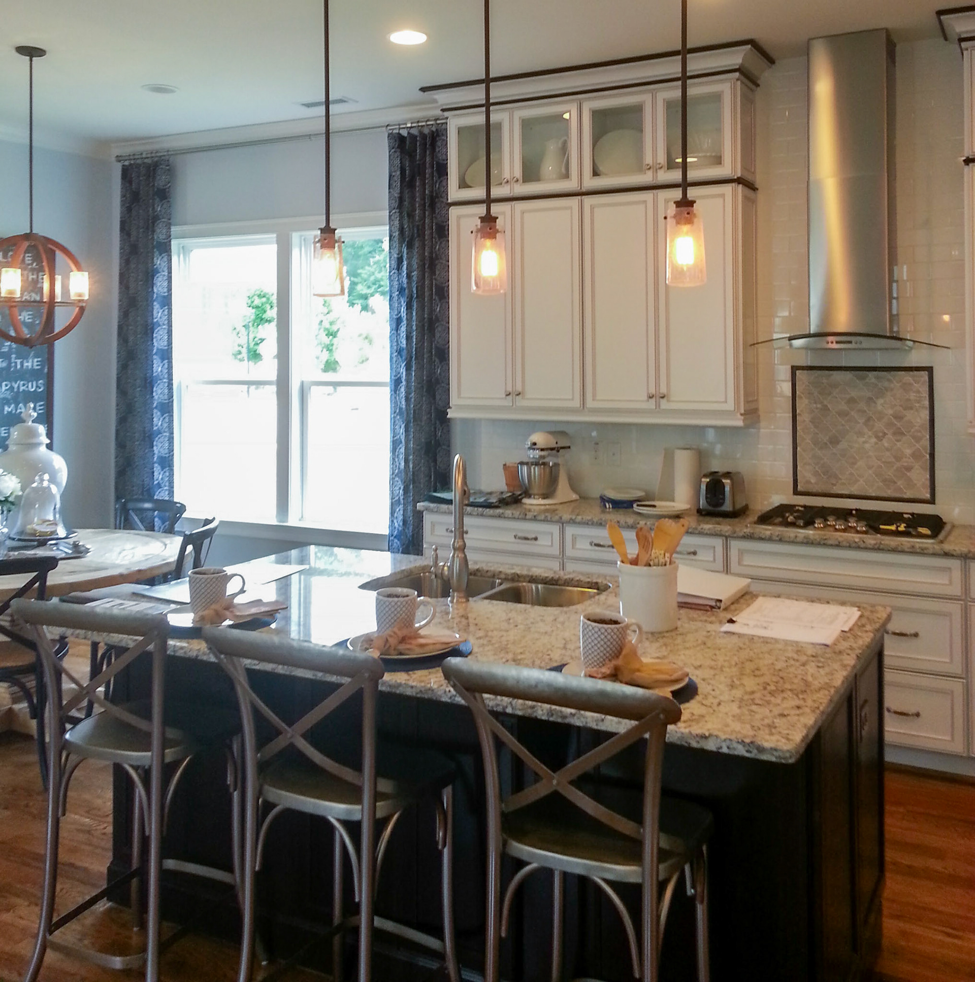 Personal Selections: Tile, flooring, and lighting. Other selections made by Model Home Interiors.