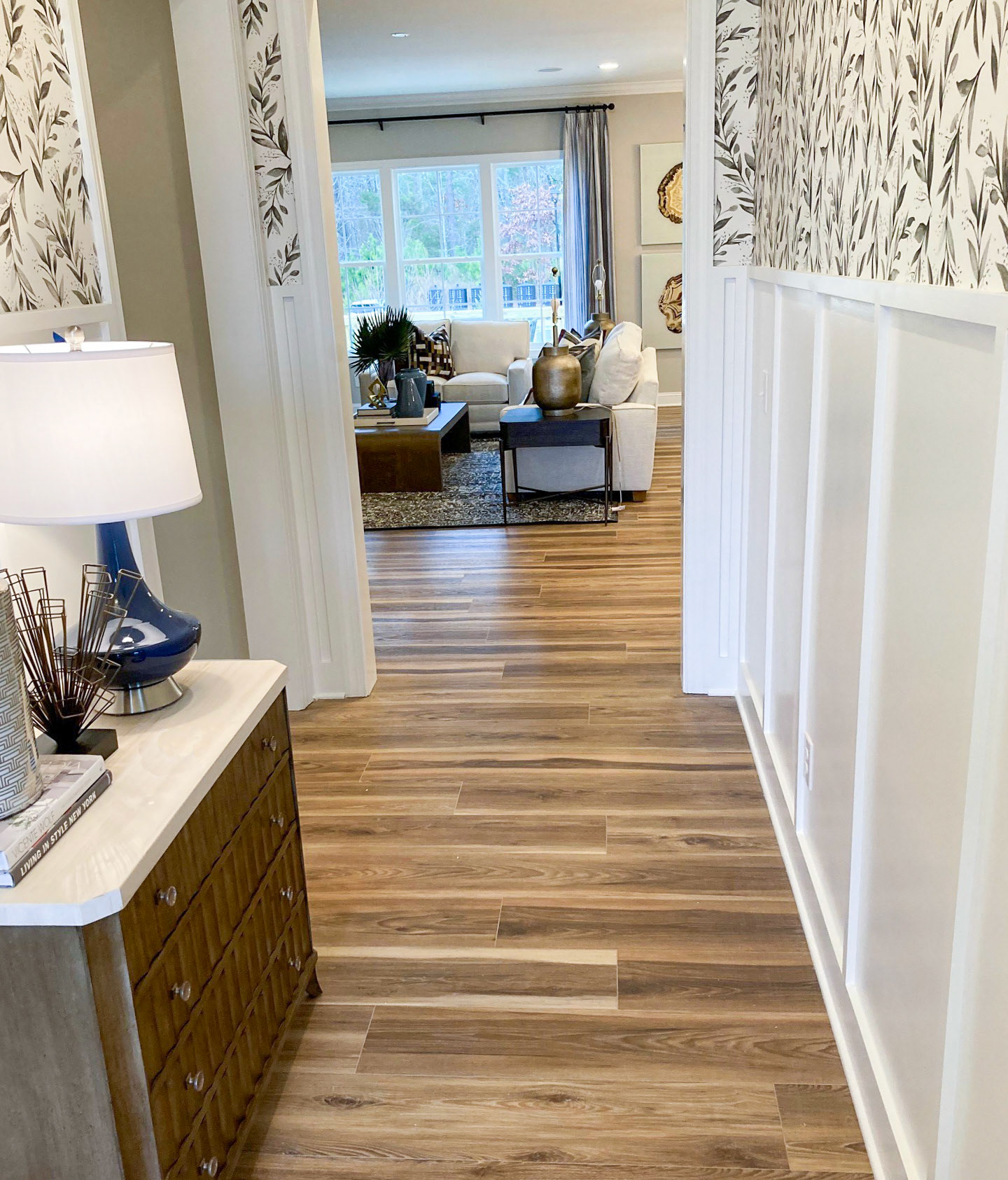 Personal Selections: Flooring & lighting. Other selections made by Model Home Interiors.