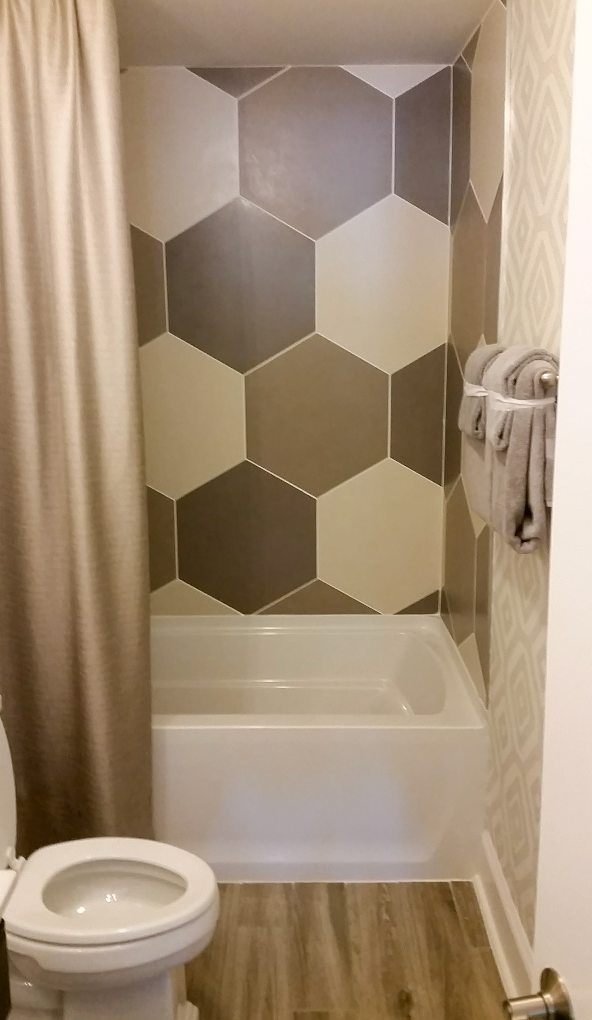 Personal Selections: Tile & lighting. Other selections made by Merchandising Concepts.
