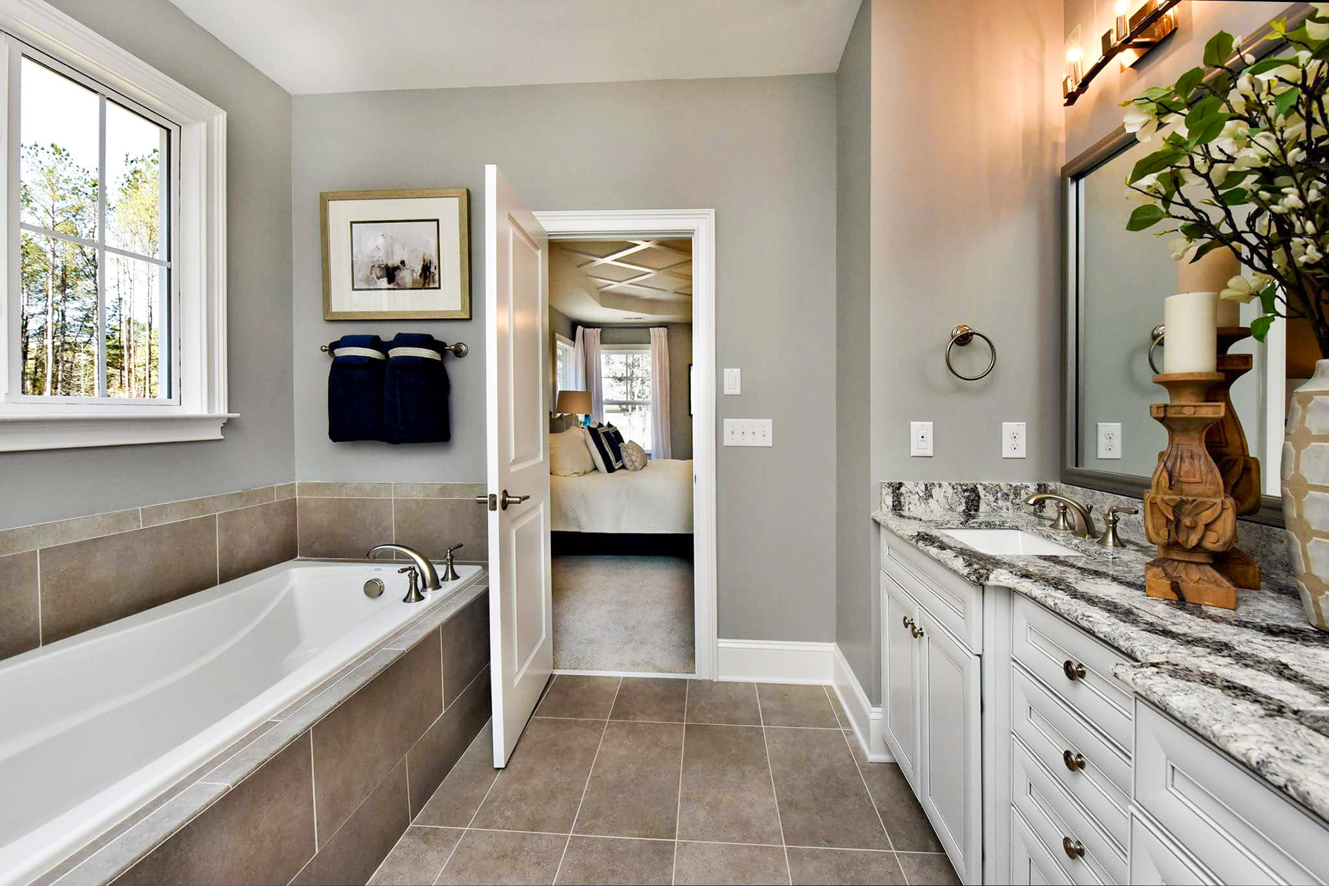 Personal Selections: Tile & lighting. Other selections made by Merchandising Concepts. Photo Credit: Stanley Martin Homes.