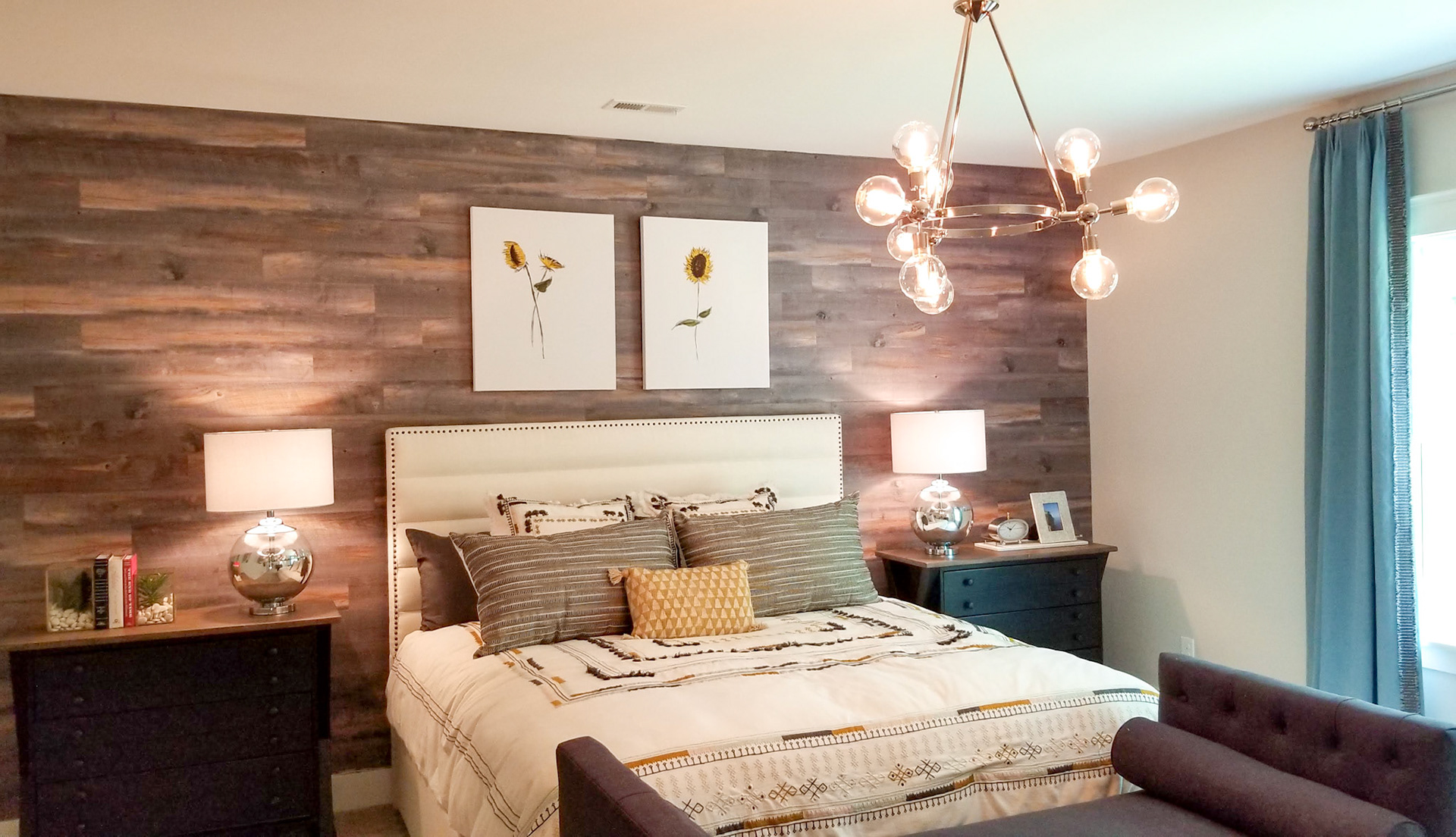 Personal Selections: Flooring, accent wall, and lighting. Other selections made by Model Home Interiors.