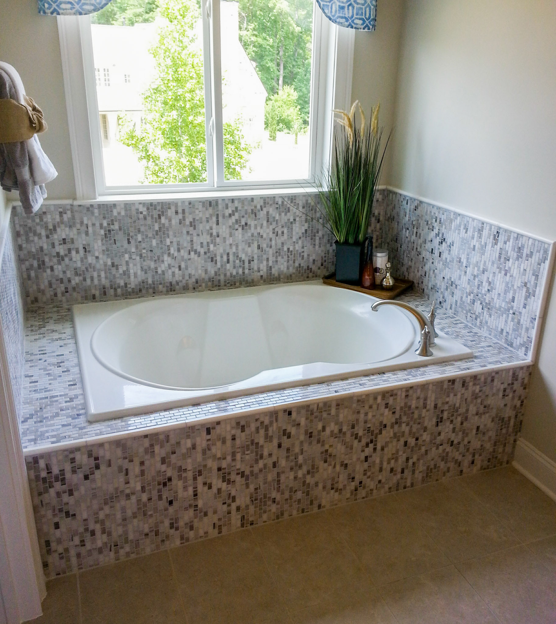 Personal Selections: Tile & lighting. Other selections made by Model Home Interiors.