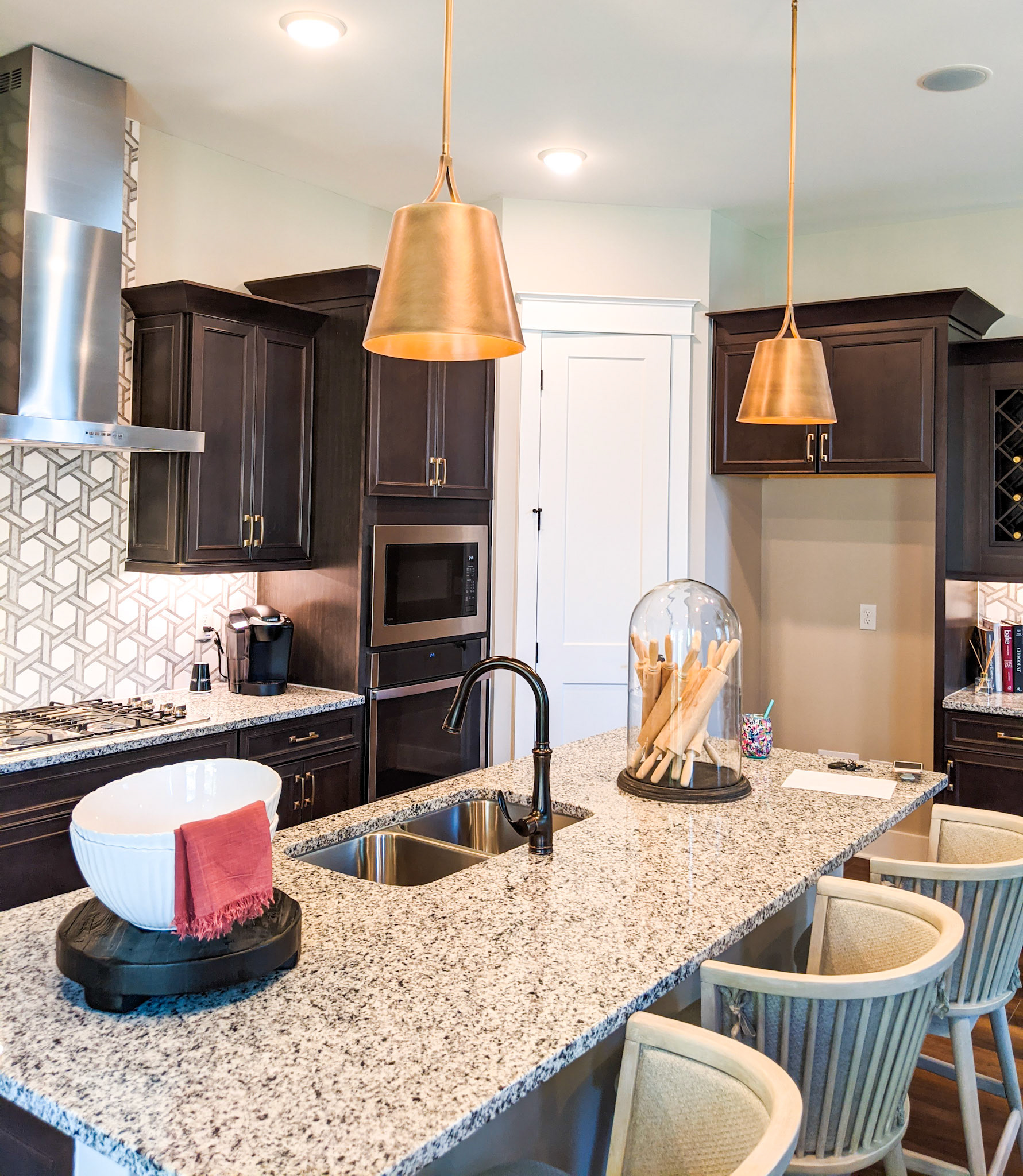 Personal Selections: Cabinets, counters, hardware, plumbing, flooring, tile, backsplash, appliances, and lighting. Other selections made by Model Home Interiors.