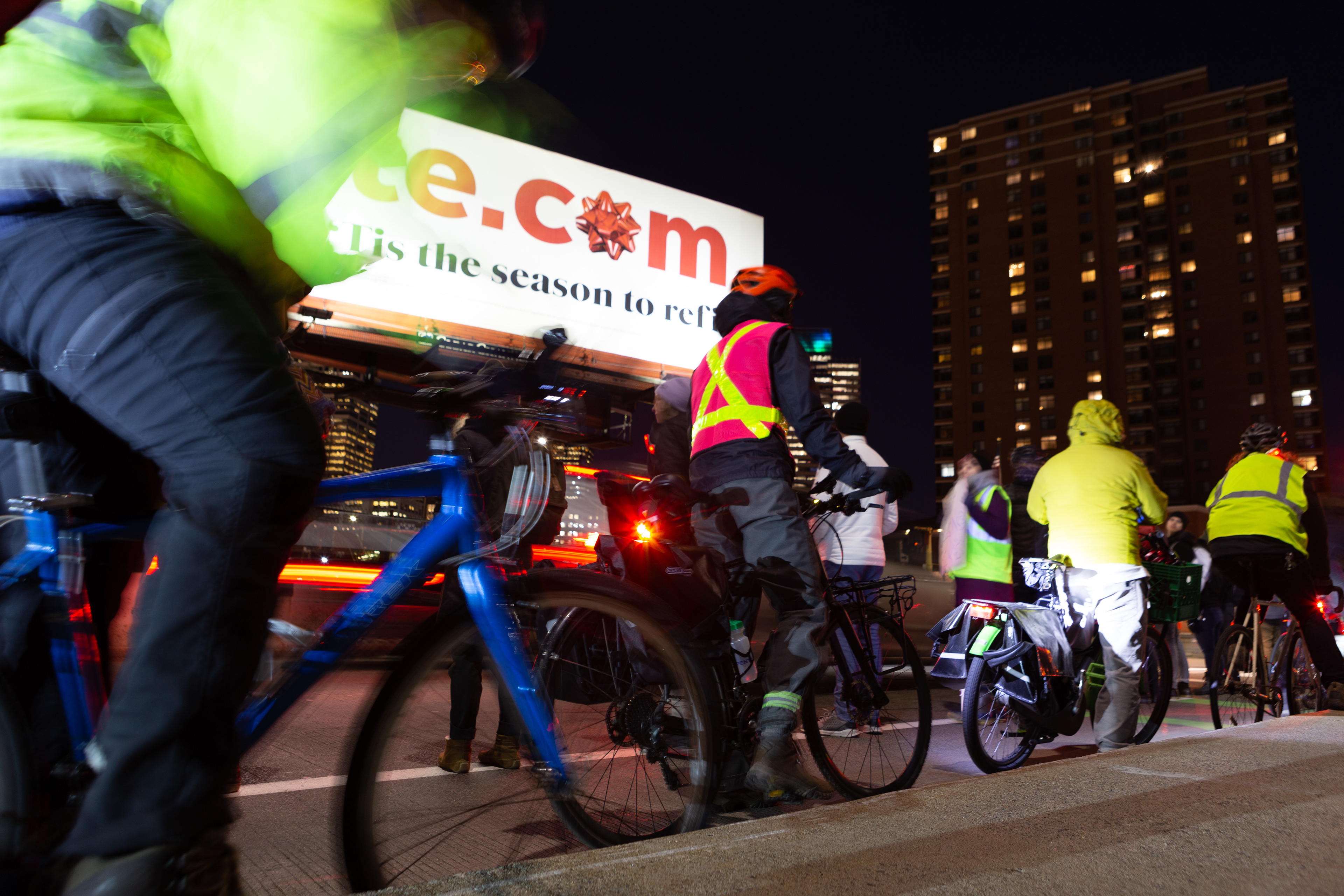 People on bicycles participate in a 'People Protected Bike Lane' demonstration in memory of a fellow bicyclist killed at the intersection of N. 12th St. and Linden Ave in Minneapolis.