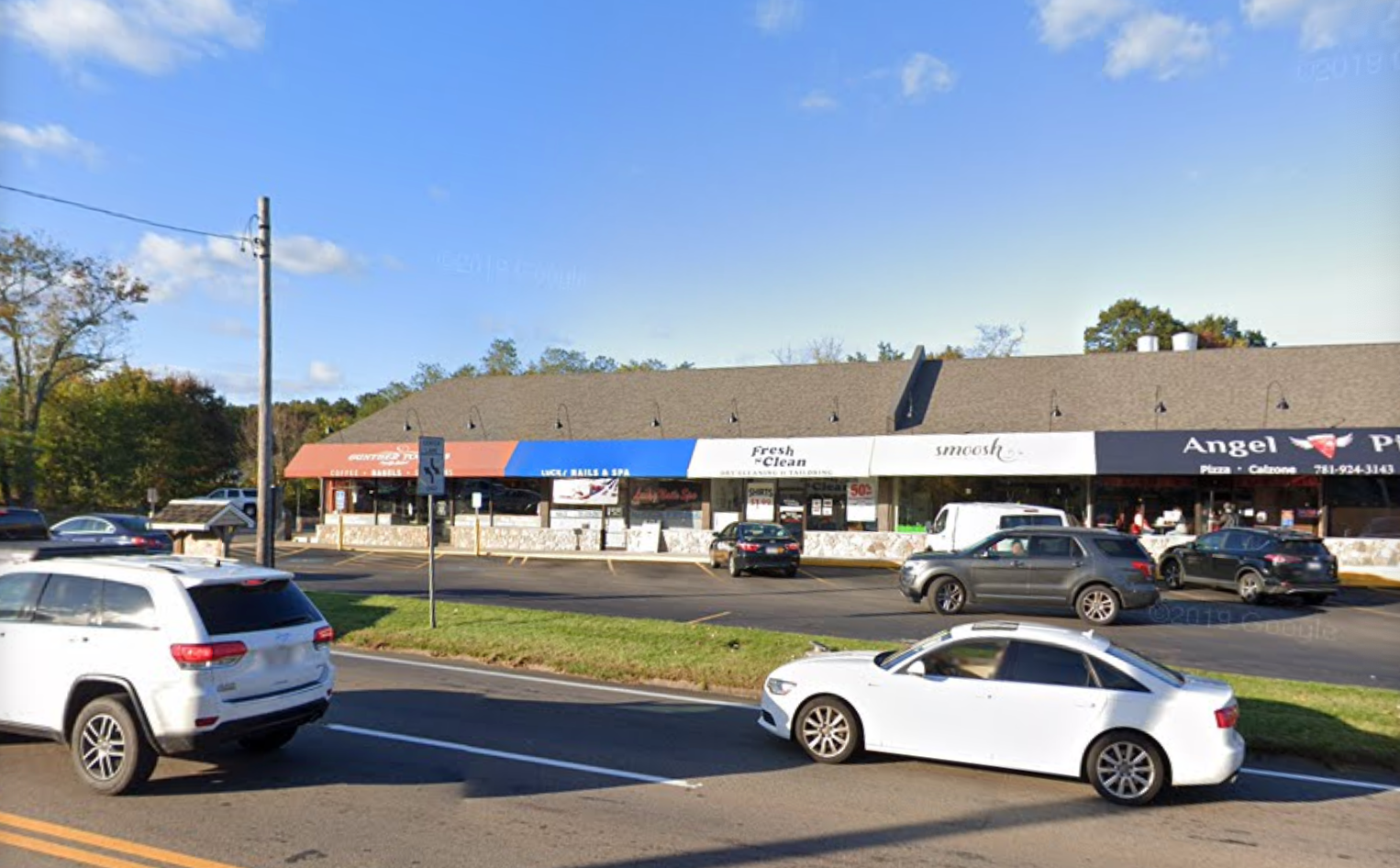 The view of the strip mall plaza.