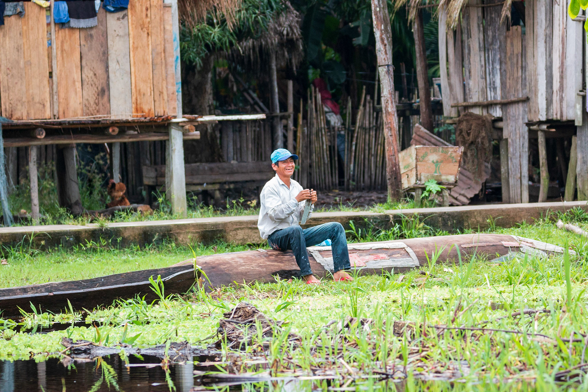 Playing the pipes on dugout canoe