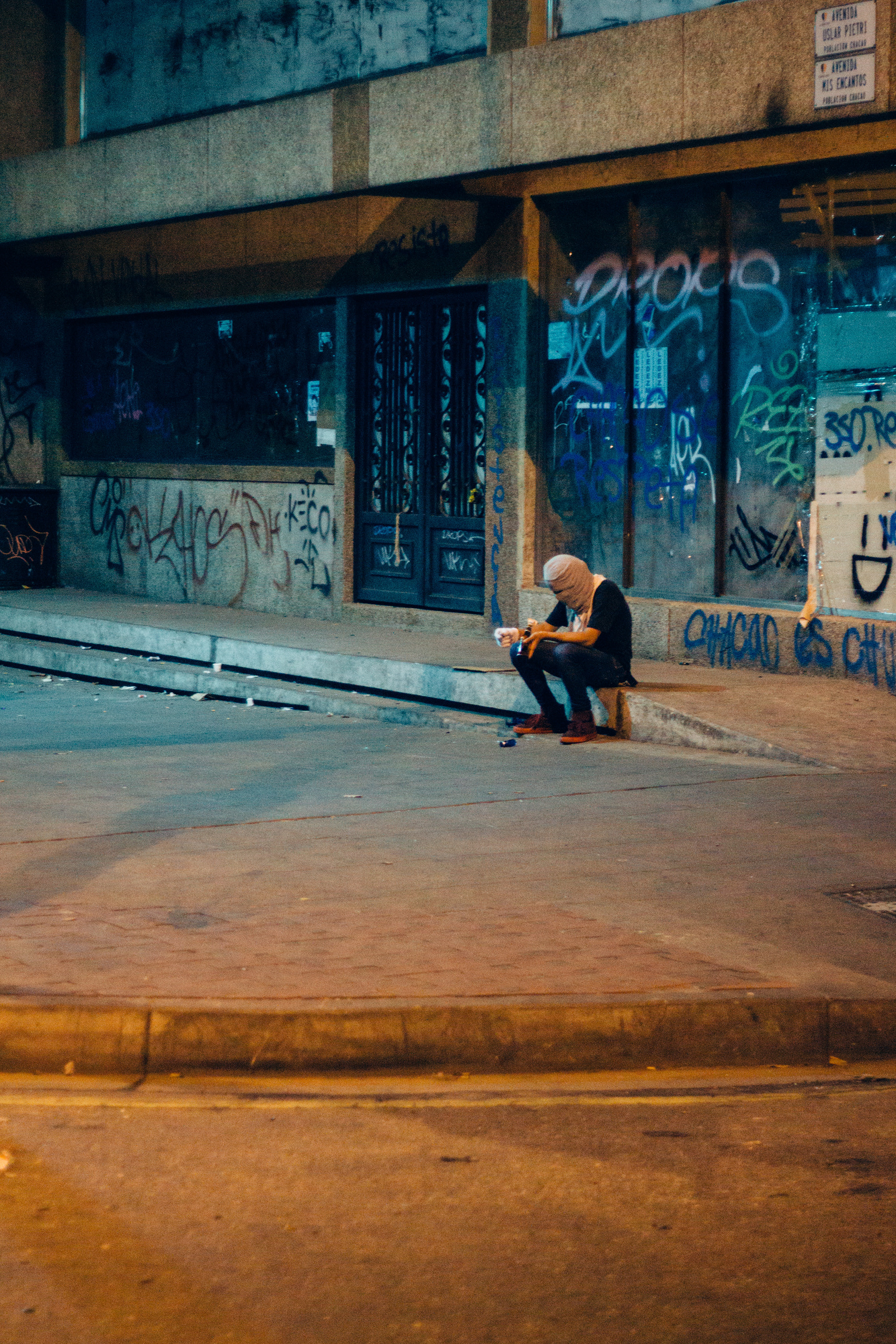 A protester having a break before going back to the front line. Caracas 2014