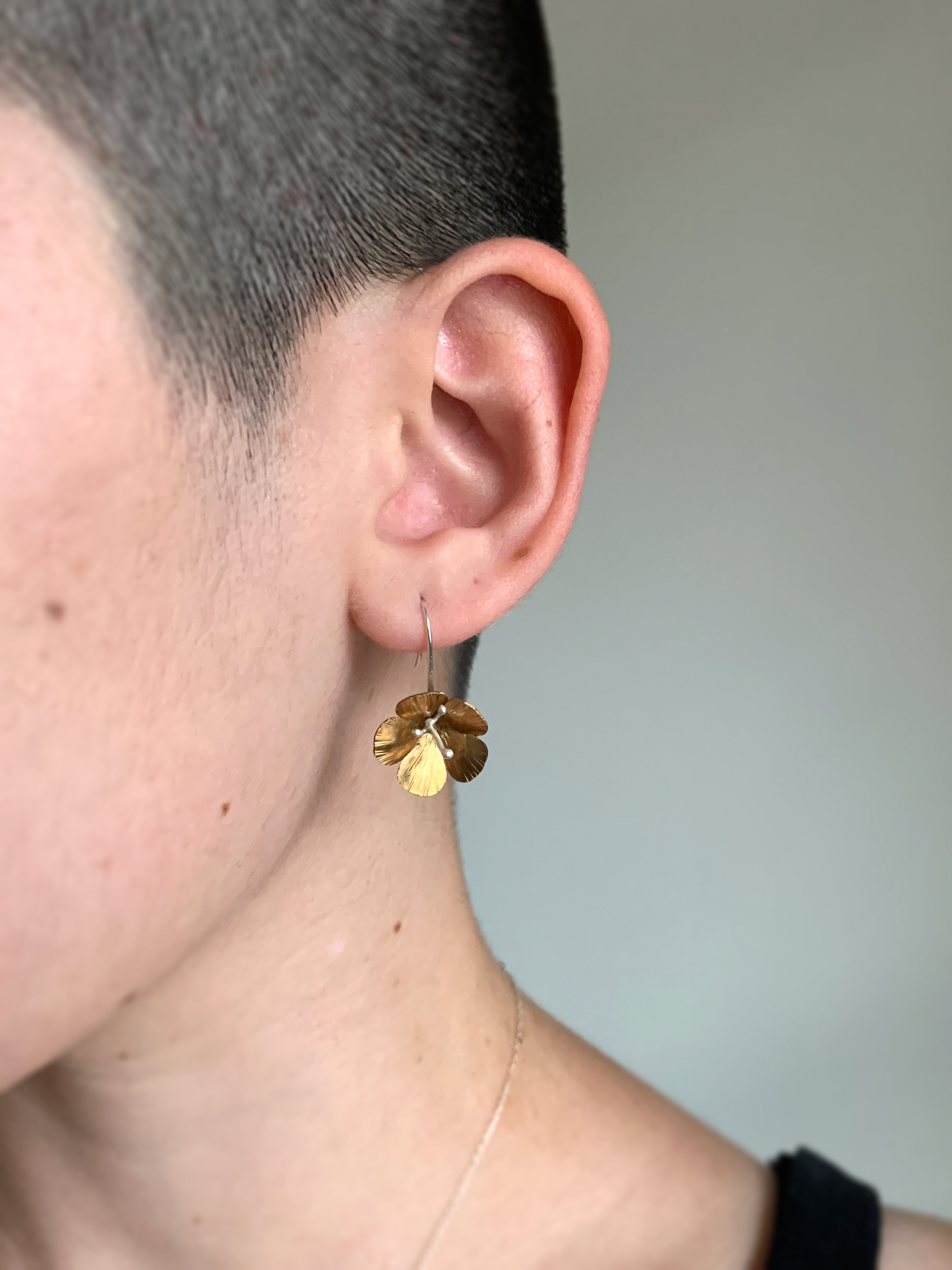 brass and silver flower threader earrings