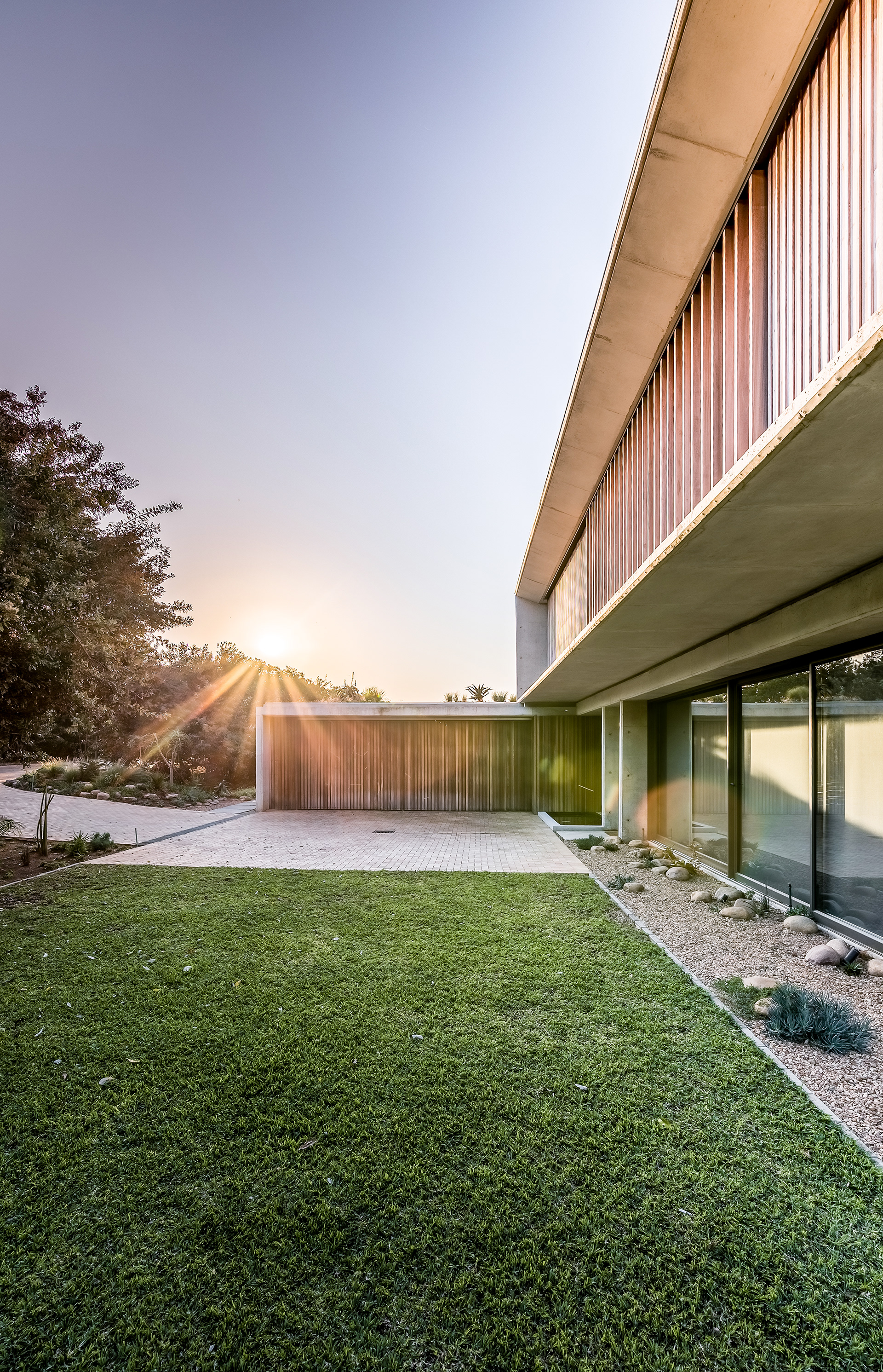 modern residential building with timber cladding and concrerte finishes
