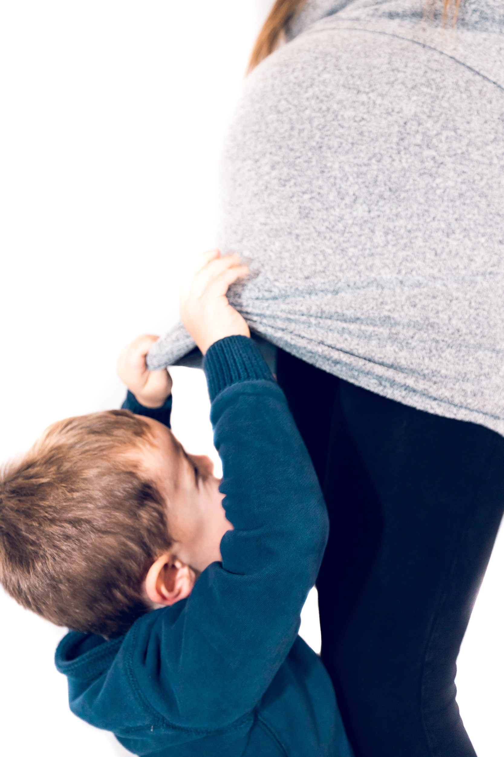 zwangere buik fotoshoot met kind