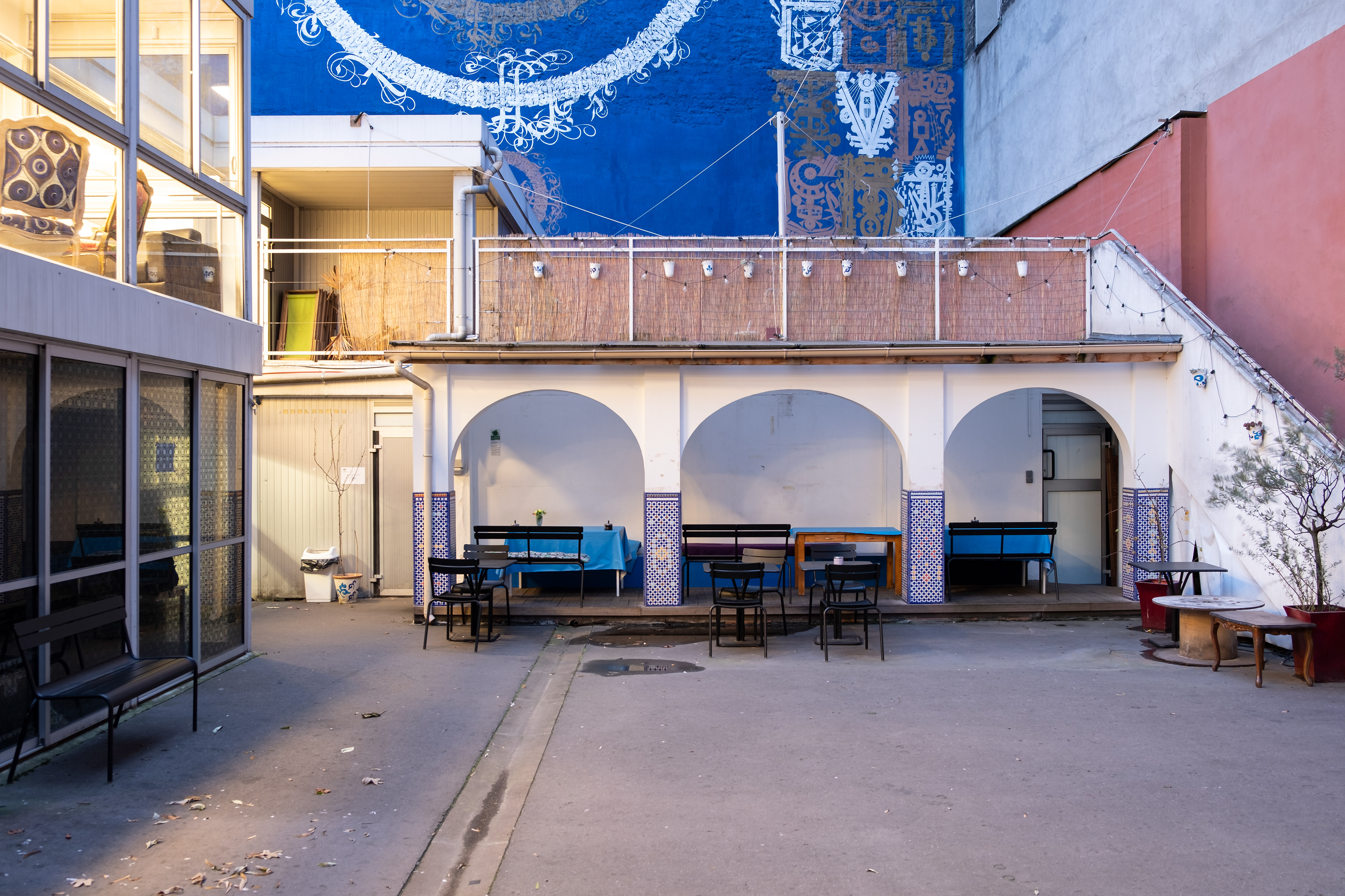 Patio area of the Institute of Islamic Cultures, where the Café d'ICI serves lunches and diners, Paris, December 2019.