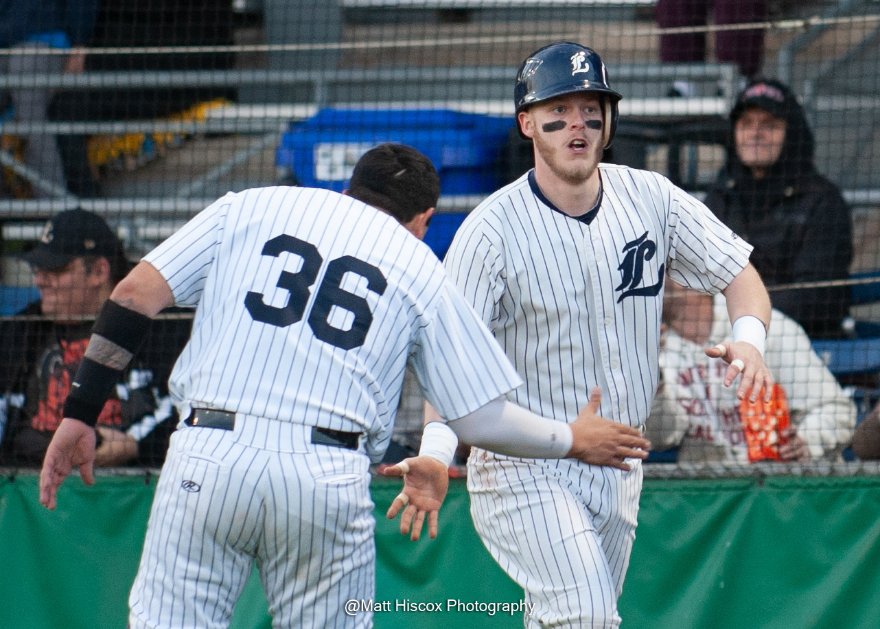 Luis Sayol low fives Mike Ambrose