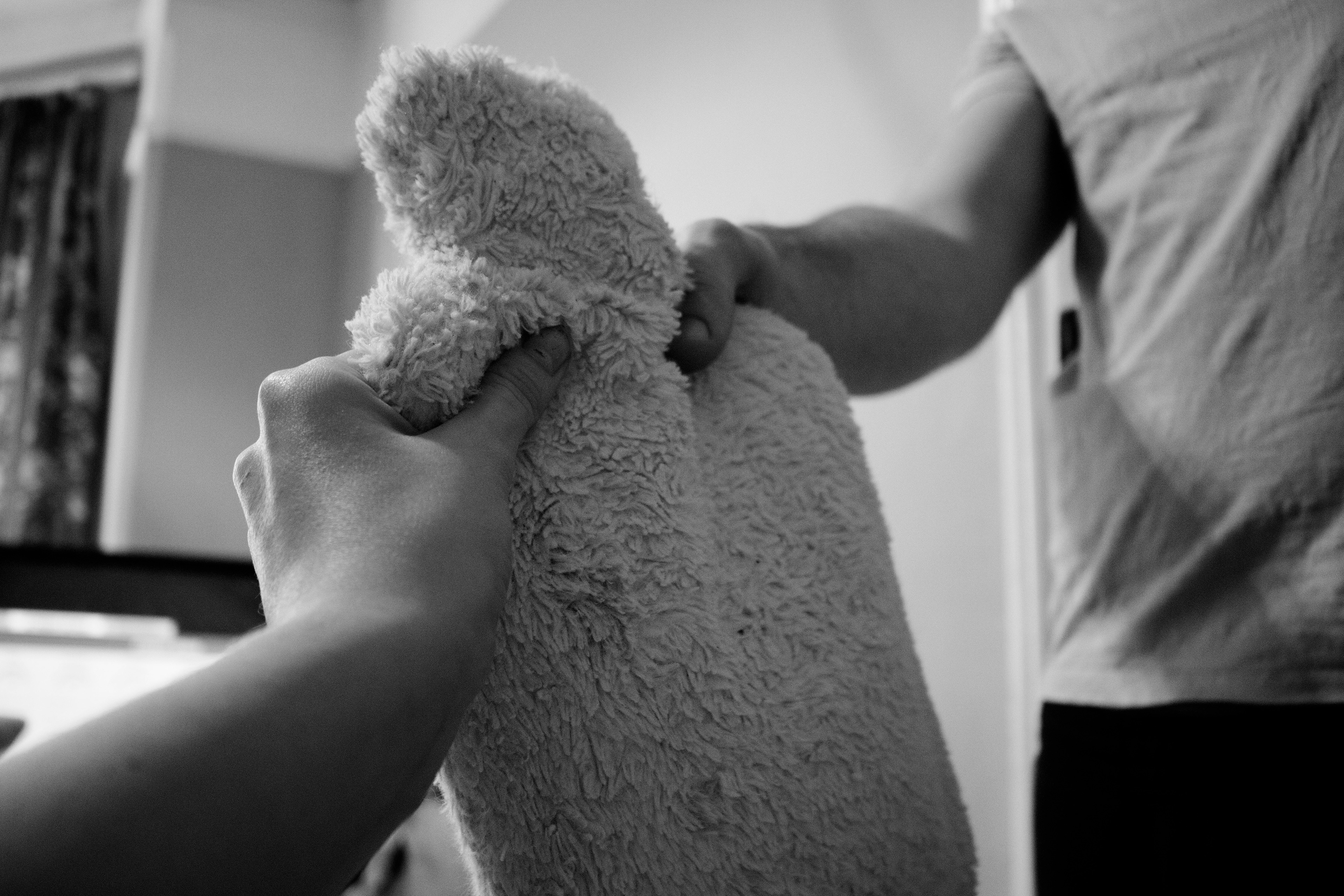 Hot water bottle being passed over to be refilled