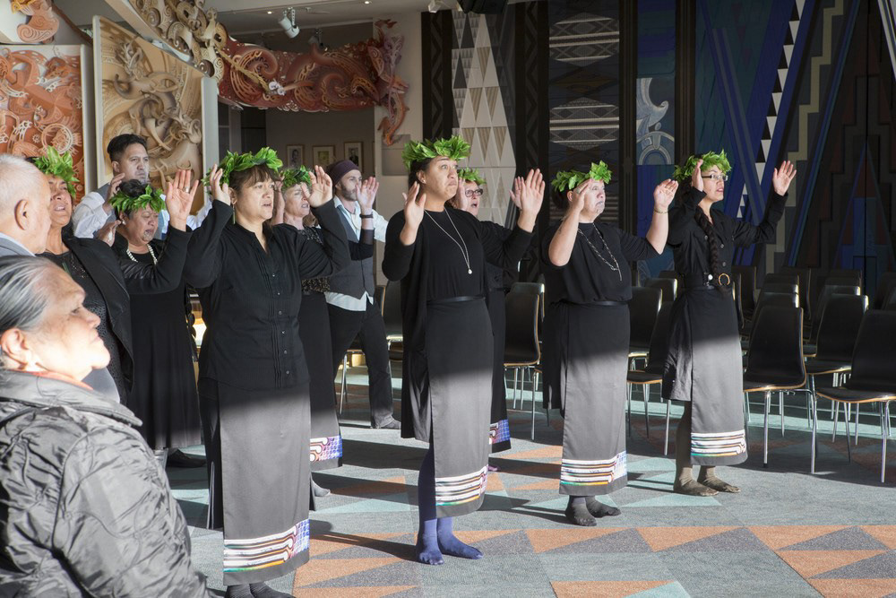 Te Papa Tongarewa staff members deliver an emotional haka powhiri (ceremonial welcome) to the tupuna (ancestors) and welcome them home to Aotearoa, New Zealand. Featured: Hema Temara, Paora Tibble, Hokimate Harwood, Shane James, Mona Pauline Mangakahia, Chrissie Locke, Rhonda Paku, Mere Boynton. Photo by Kate Whitley, May 25, 2015. te Papa