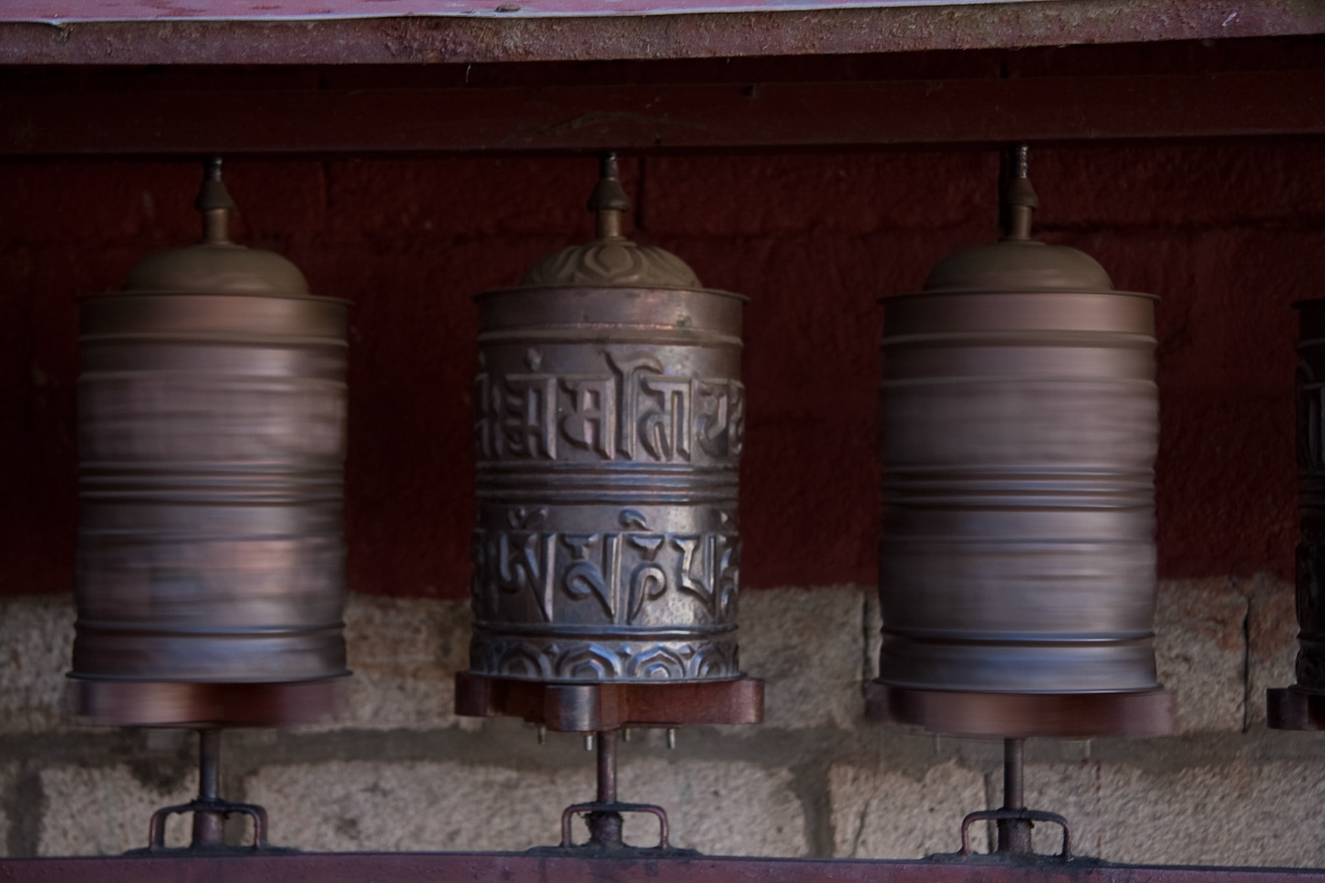 Spinning prayer wheels at Thangboche monastery