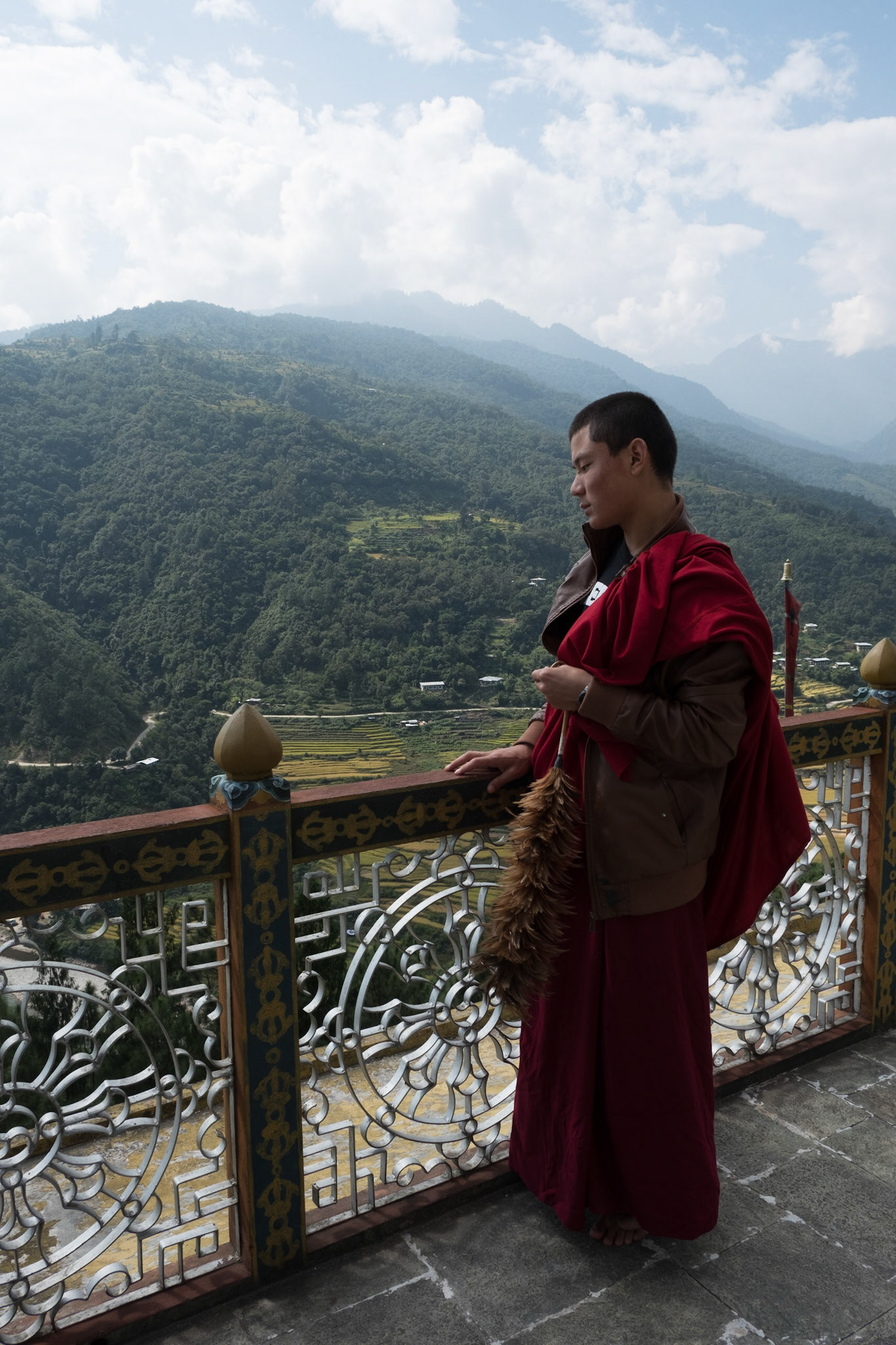 Monk at the top of Khansum Yulley temple