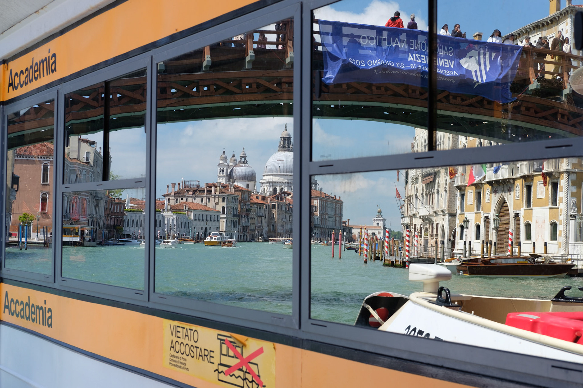 Venice reflections in a vaporetto stop