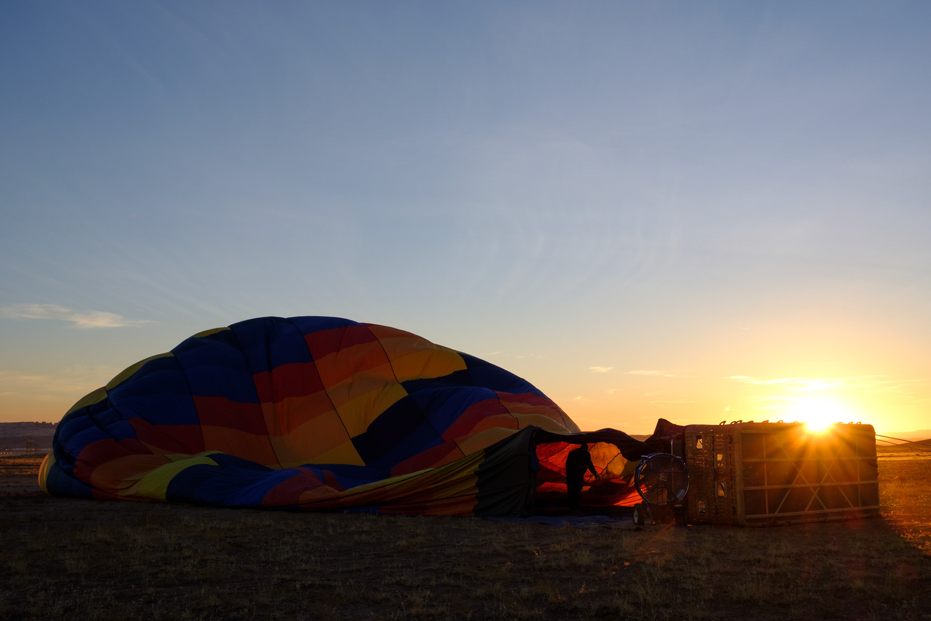 Sunrise whilst the hot air balloon is inflating