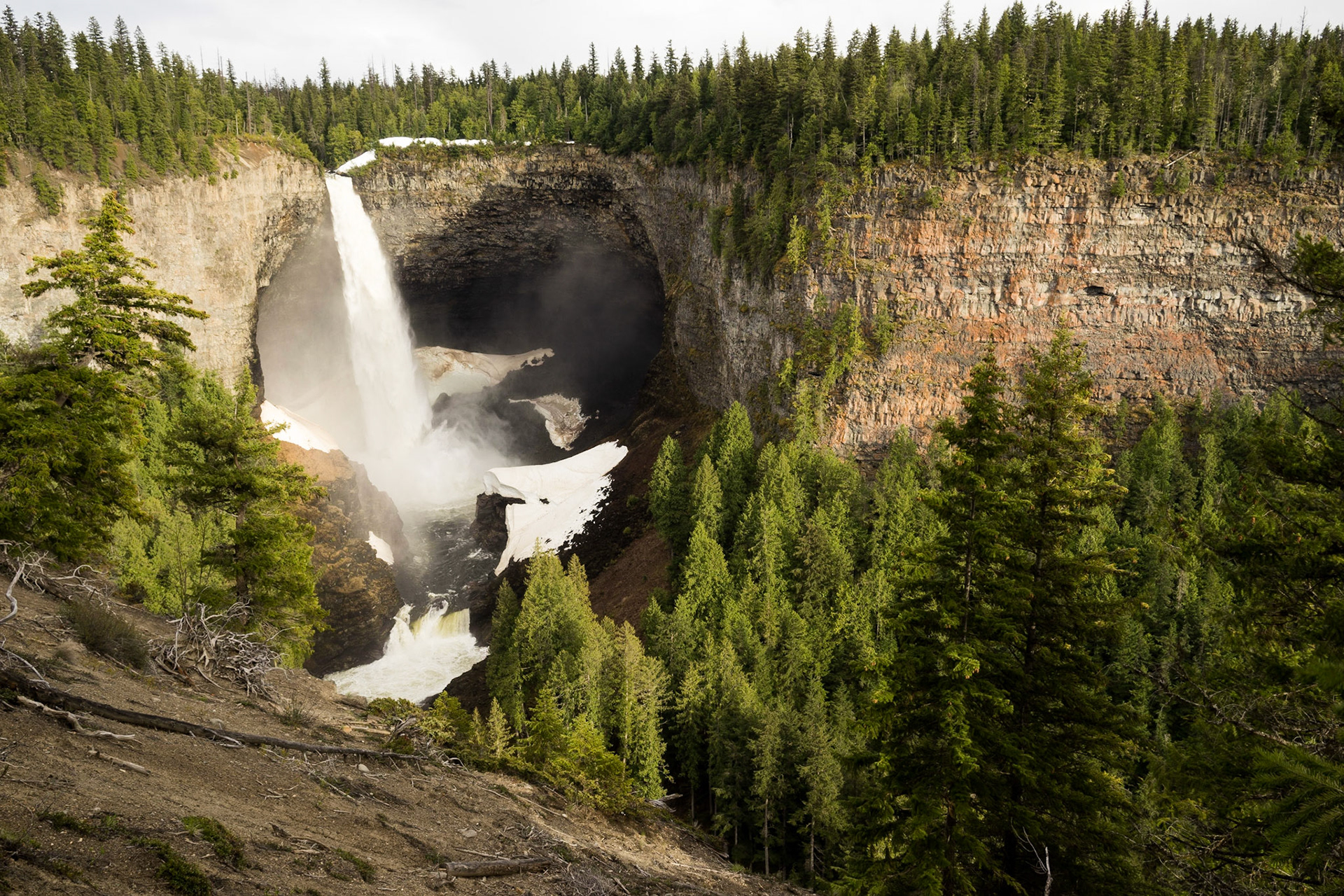 Snow and ice at the base of the Helmcken Falls. Near Clearwater BC, Canada.
