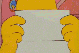 Homer Simpson reading a message before standing up and screaming in anger
