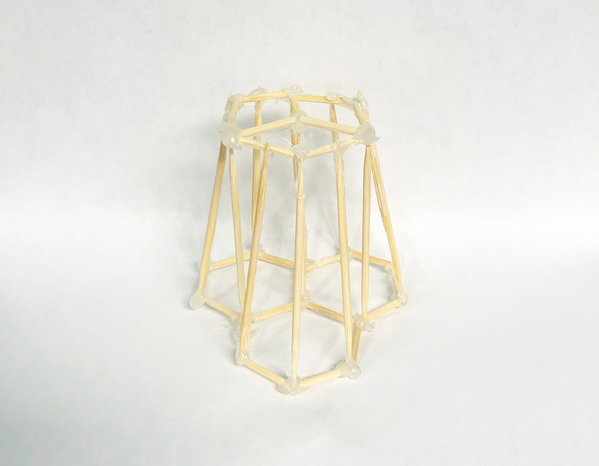Toothpick and hot glue prototypes explored how it could come together