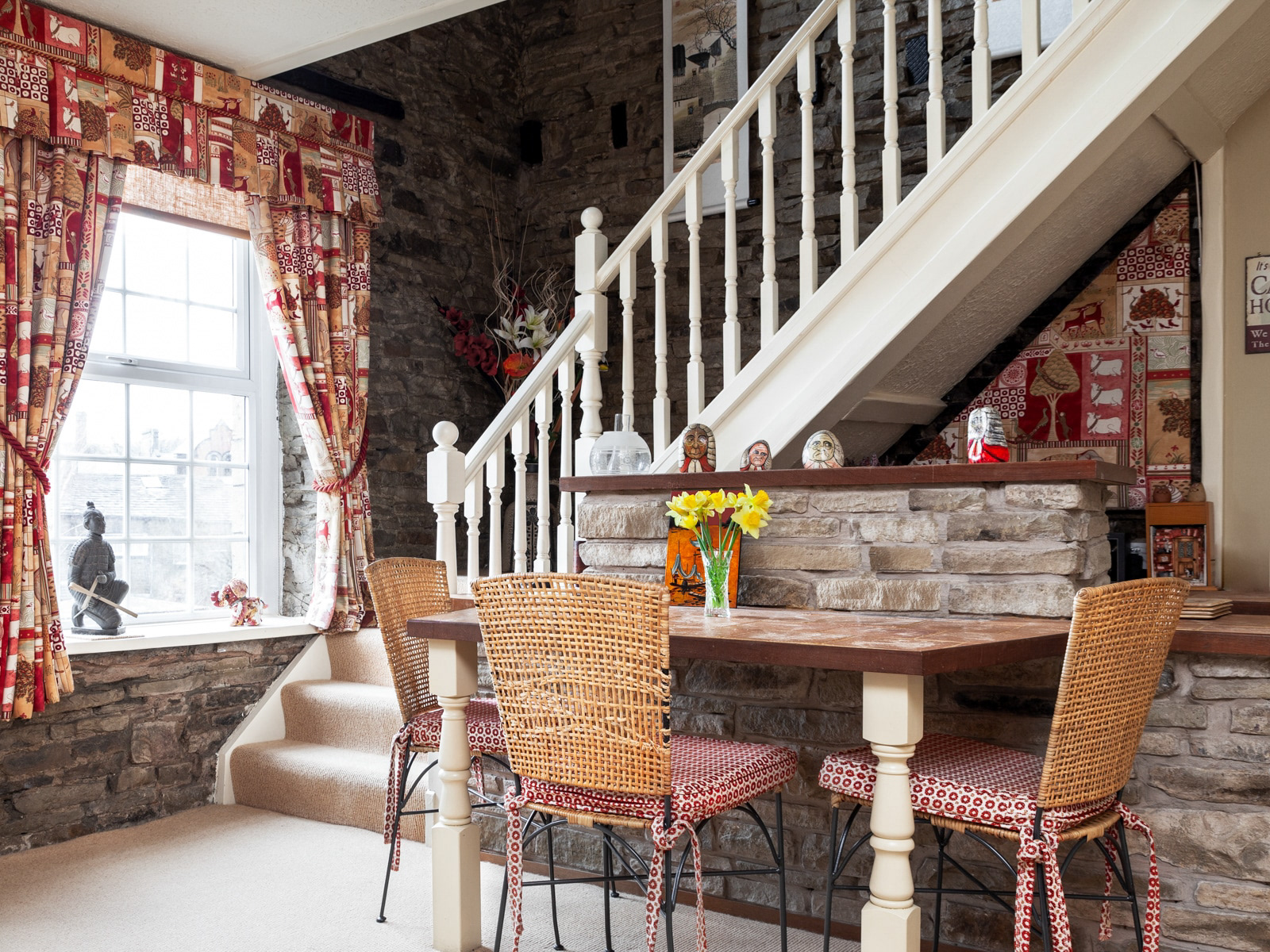 Traditional interior design in this 19th Century property, showcasing wonderful stonework throughout